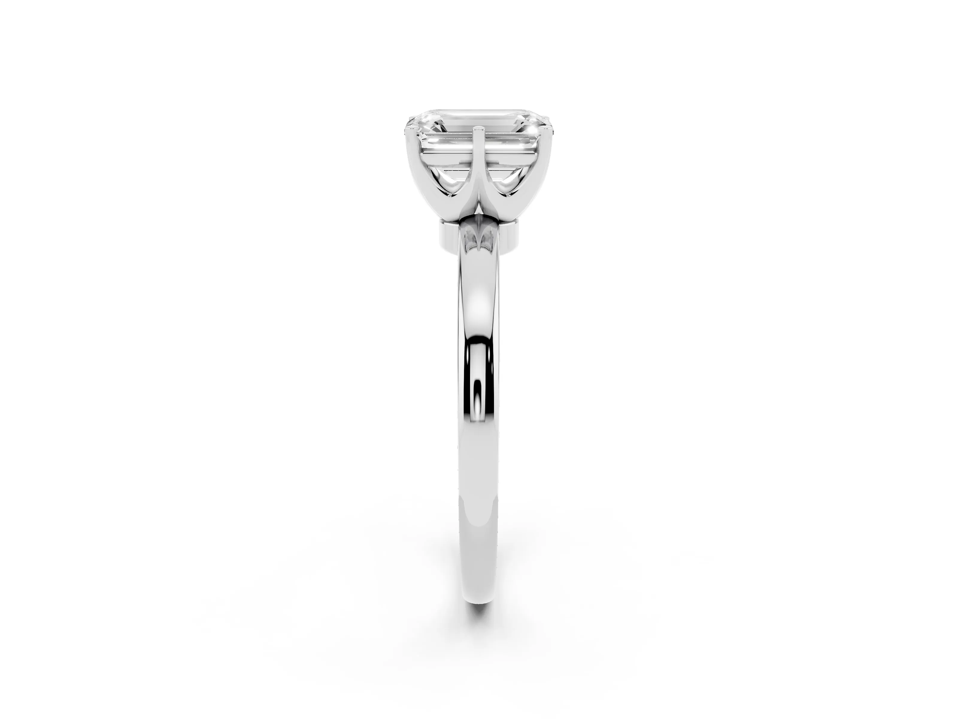 Emerald Cut Diamond Solitaire Ring Set in White gold with Raised Prong Setting on a Classic Band