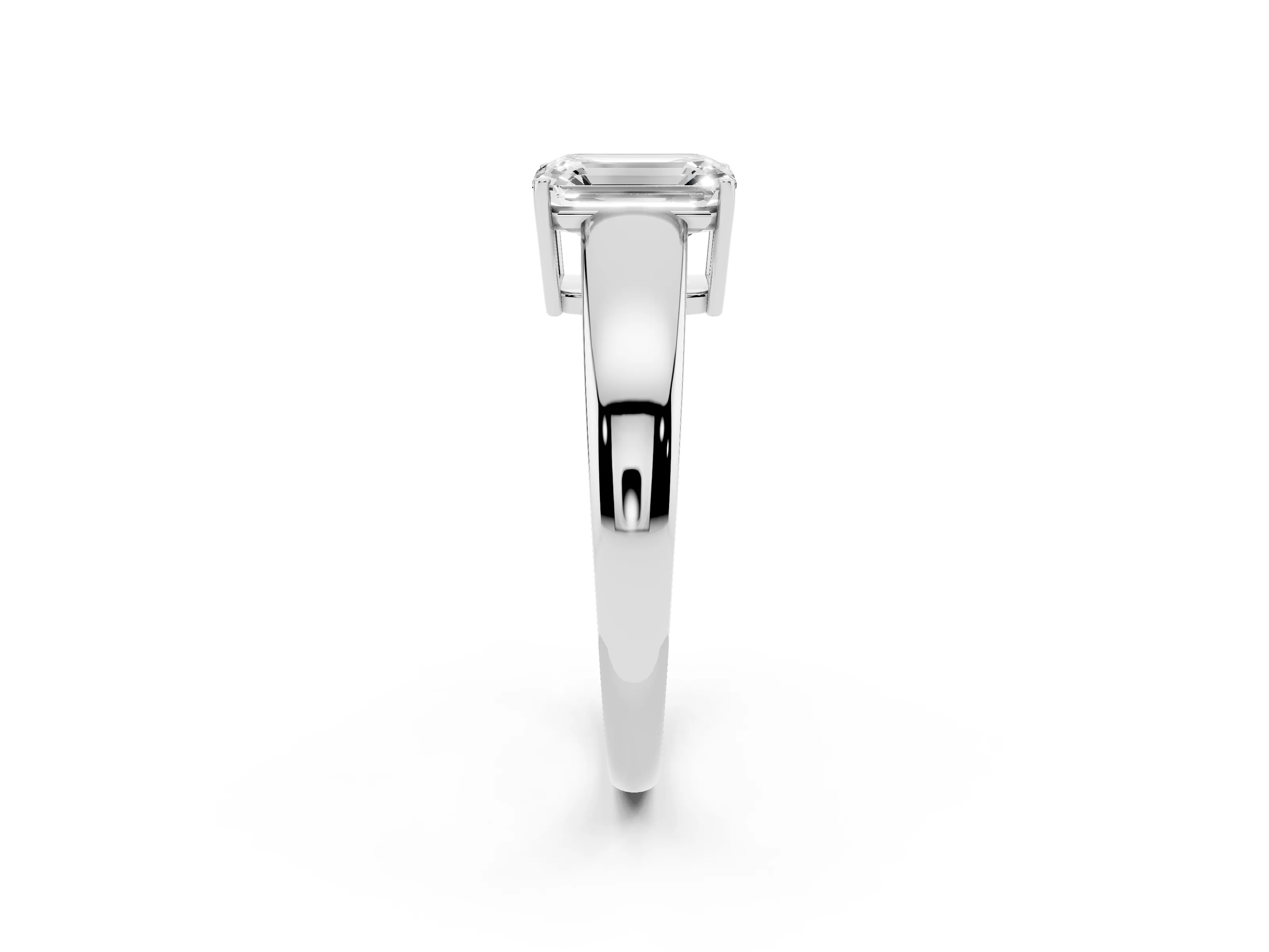 Emerald Cut Diamond Solitaire Ring Set in White gold with Tapered Band and Prong Setting