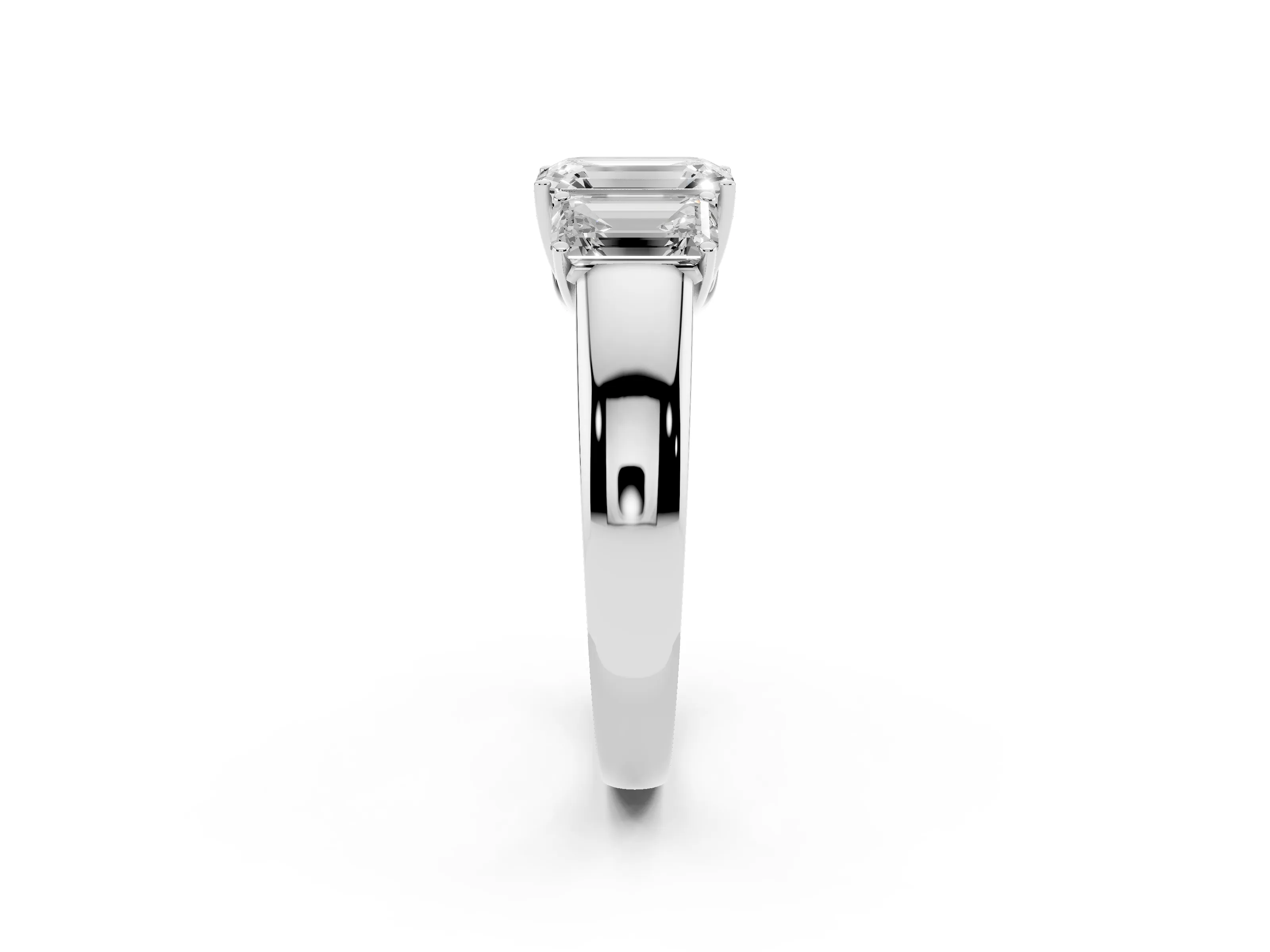 Three-Stone Emerald Cut Diamond Ring Set in Silver with Matching Prong Settings and Plain Band