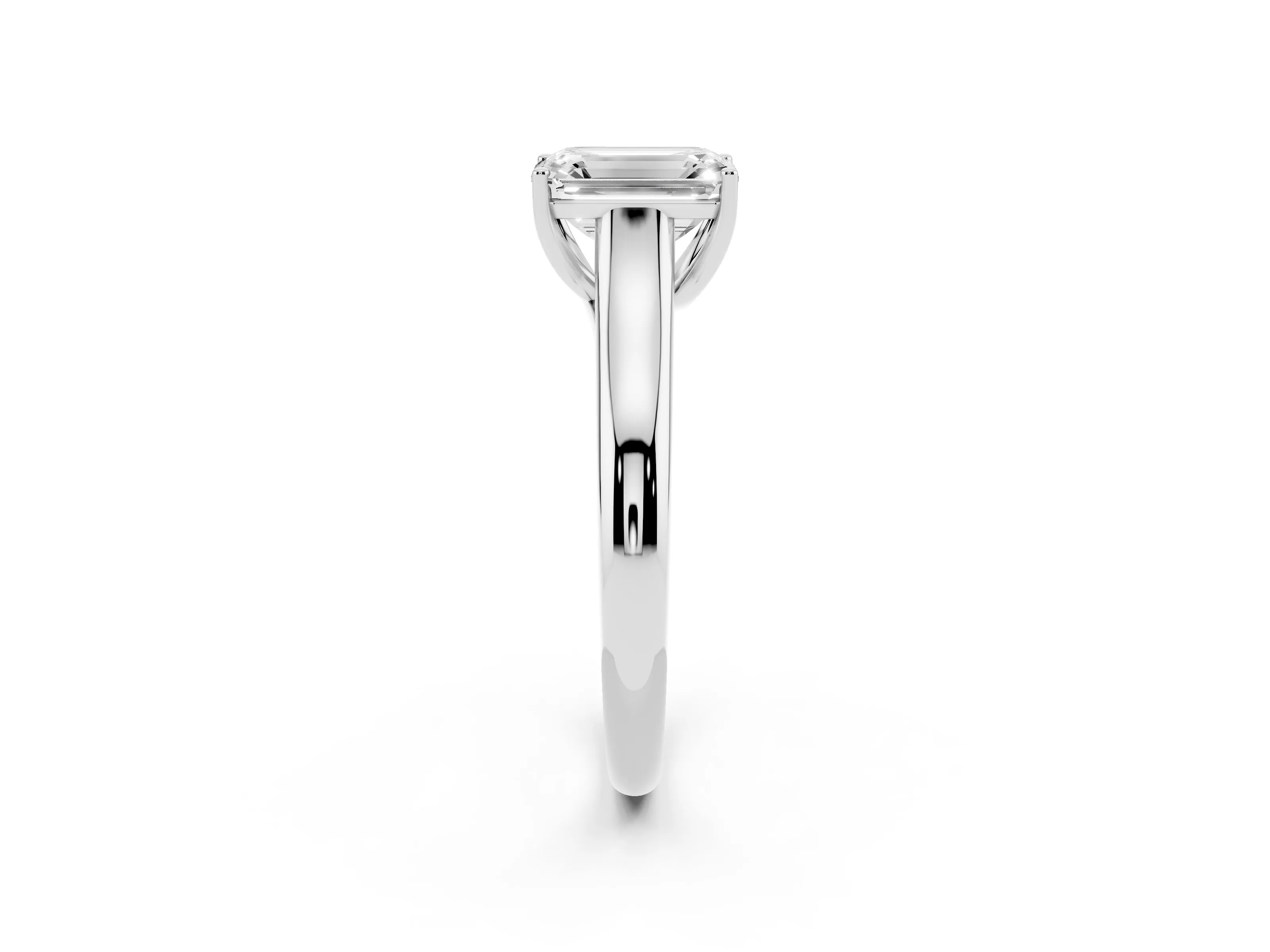 Emerald Cut Diamond Solitaire Engagement Ring Set in White gold with Subtly Tapered Band and Prong Setting