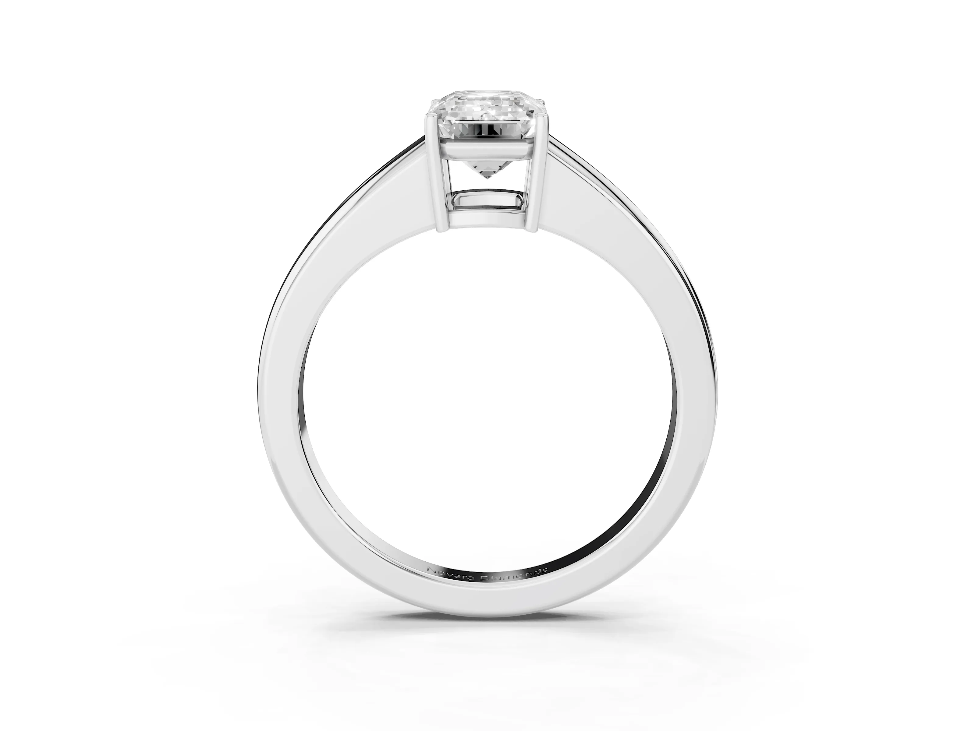 Emerald Cut Diamond Solitaire Ring Set in White gold with Tapered Band and Prong Setting