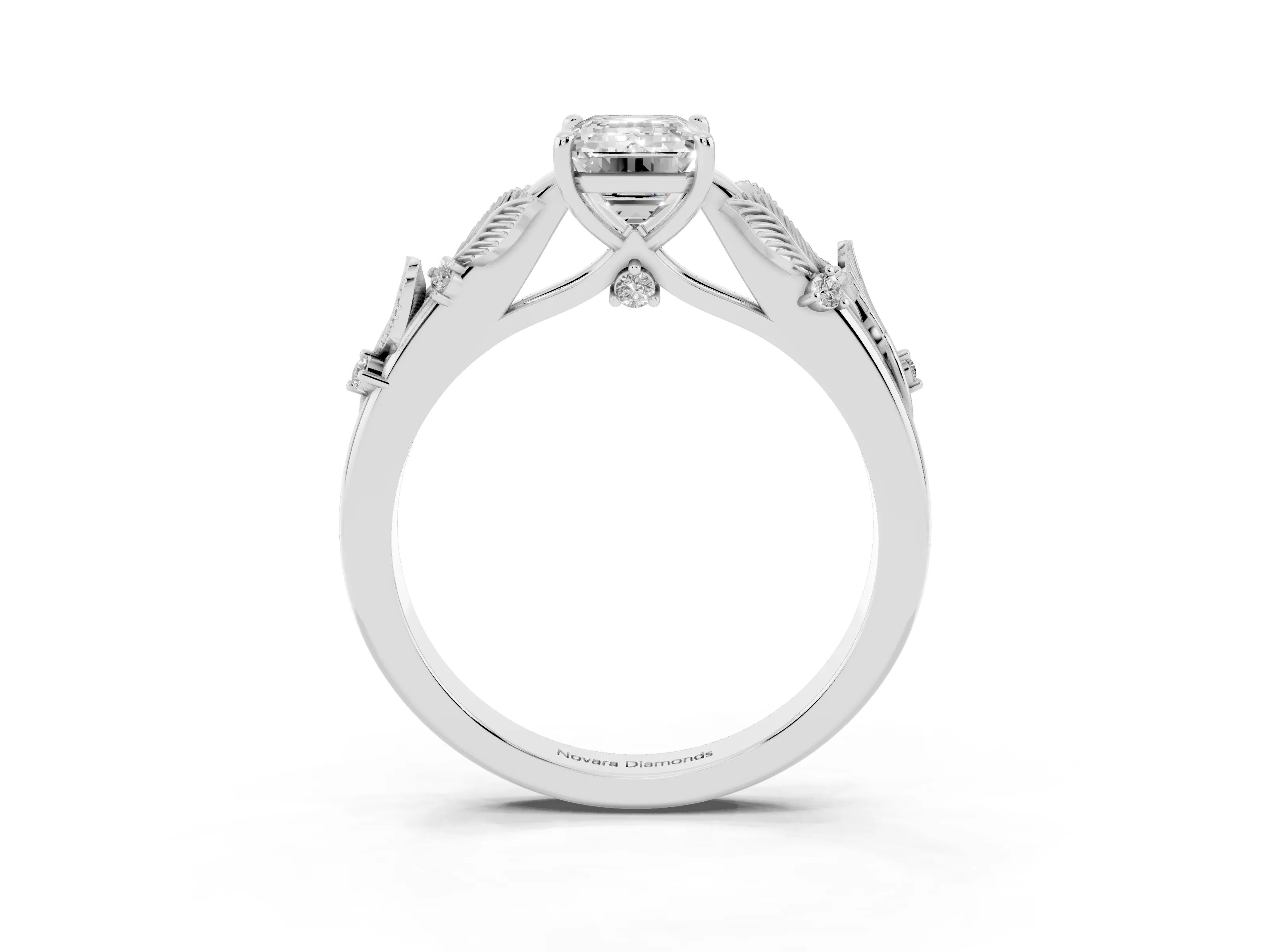 Emerald Cut Diamond Solitaire Ring Set in Platinum with Leaf Motif Band