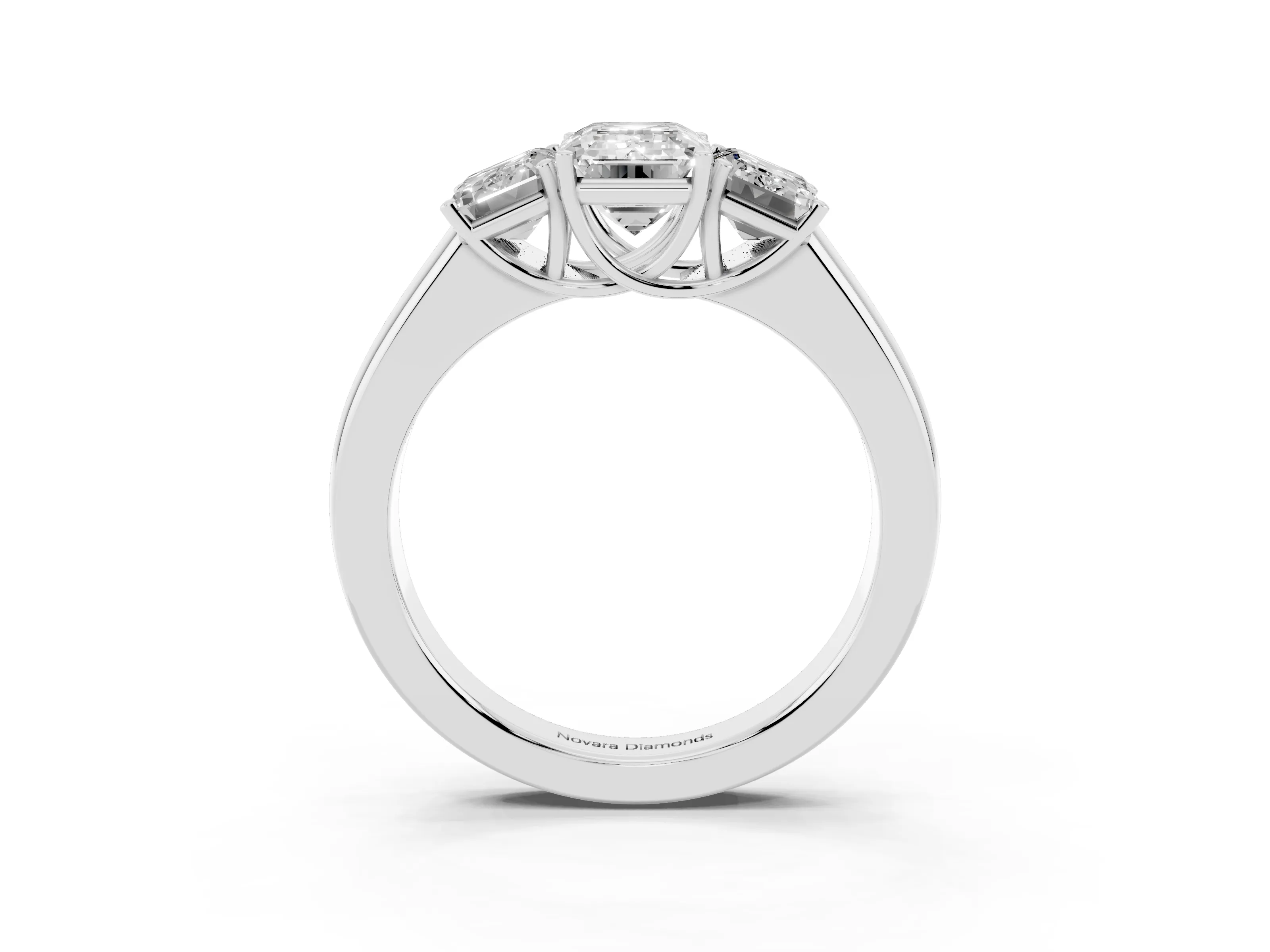 Three-Stone Emerald Cut Diamond Ring Set in Silver with Matching Prong Settings and Plain Band