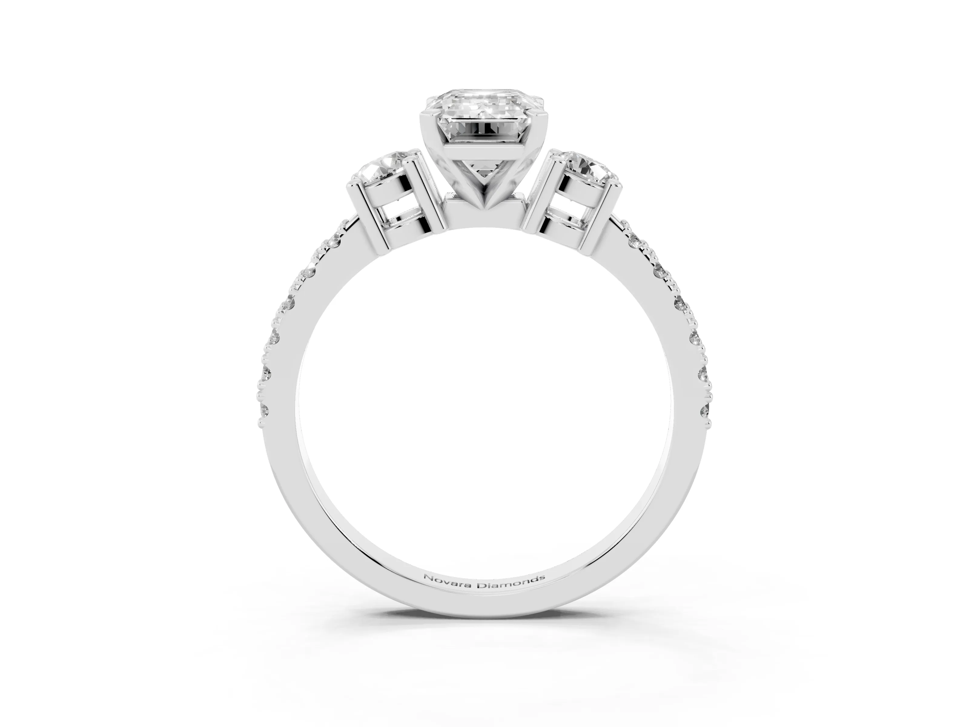 Three-Stone Emerald Cut Diamond Pavé Band Ring Set in Platinum with Prong Setting