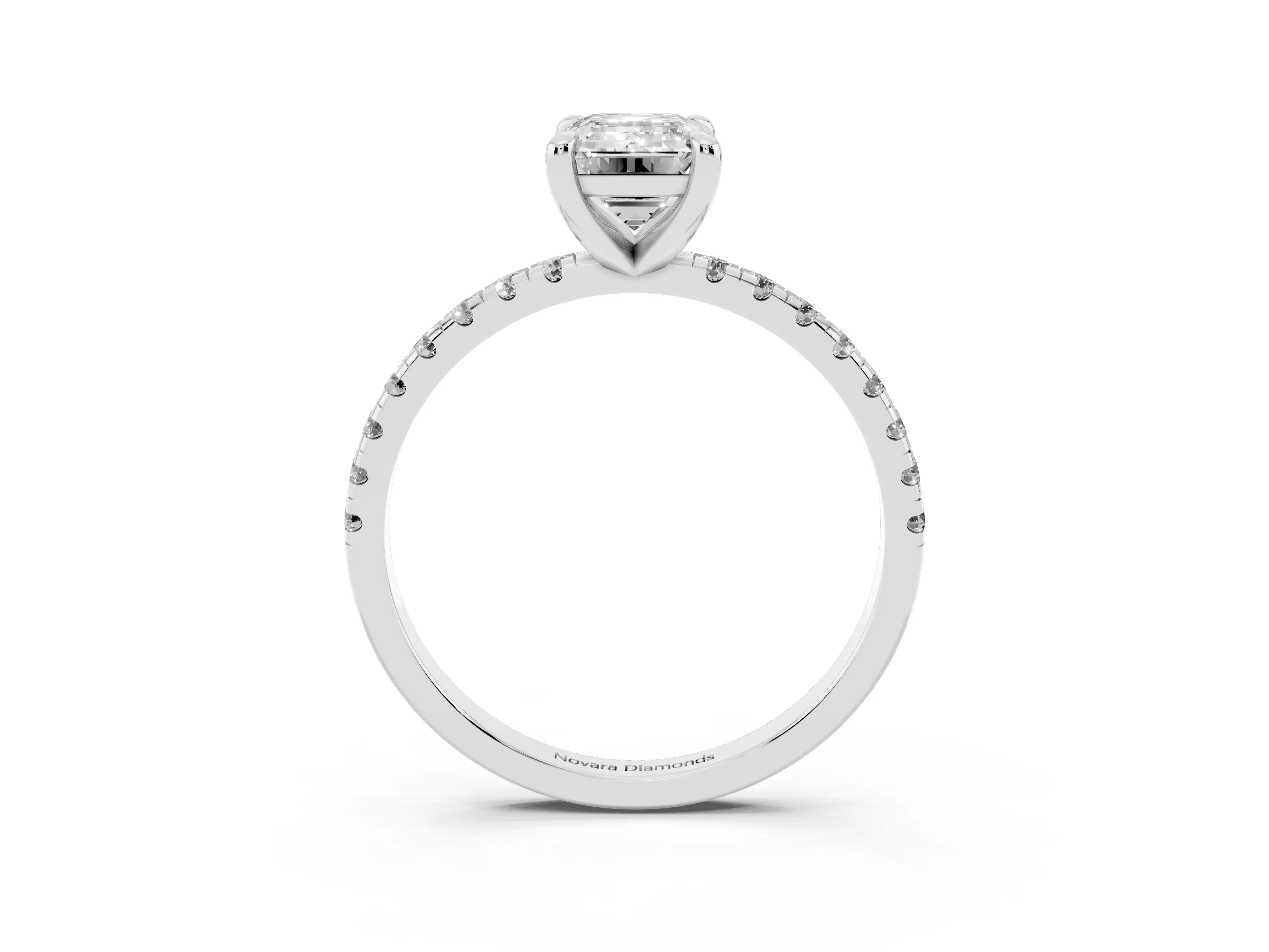 Emerald Cut Diamond Brilliant Solitaire Ring Set in White gold with Pavé Band and Prong Setting