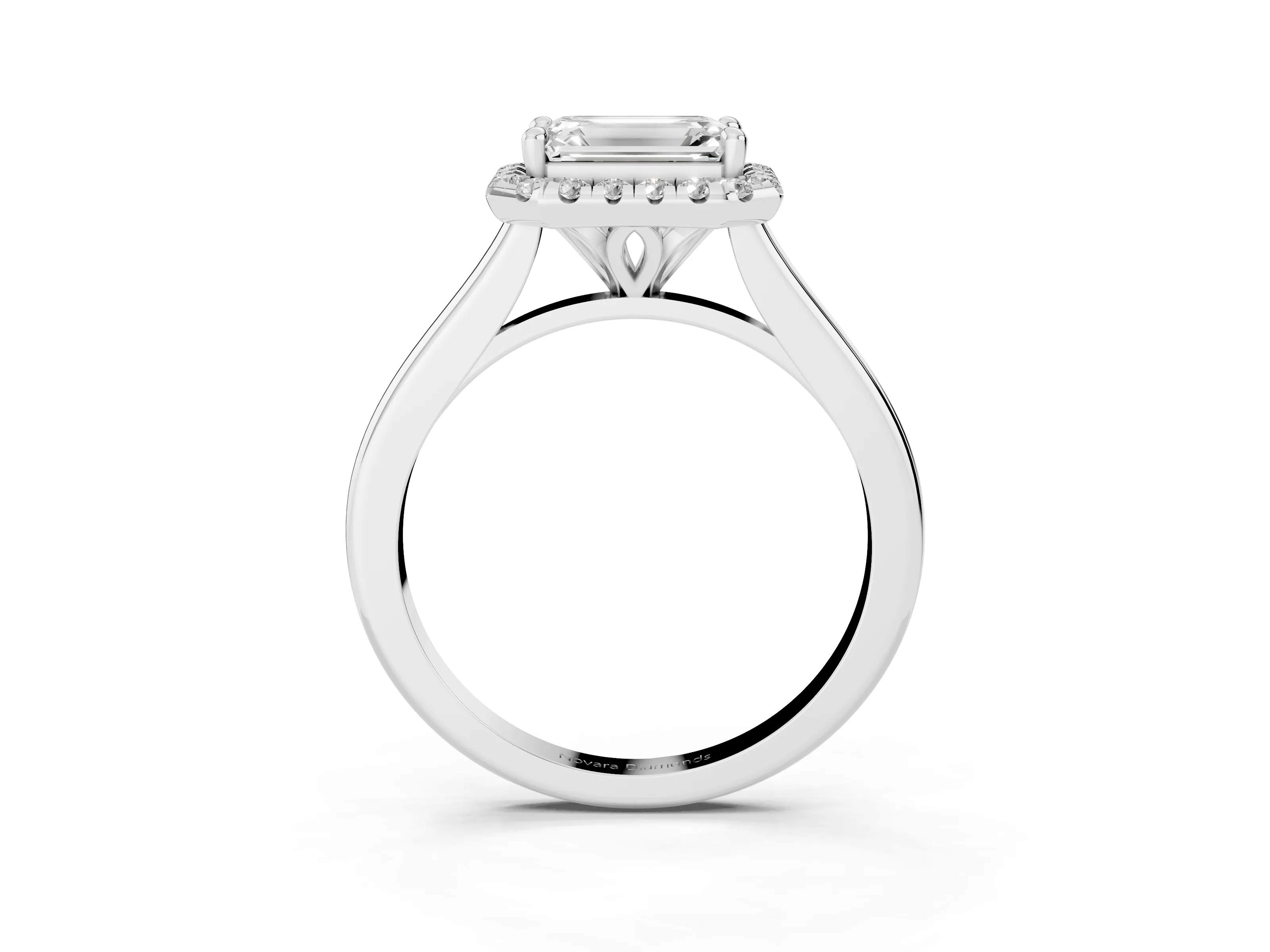 Emerald Cut Diamond Halo Engagement Ring Set in White gold with Pavé Band and Rising Shoulders