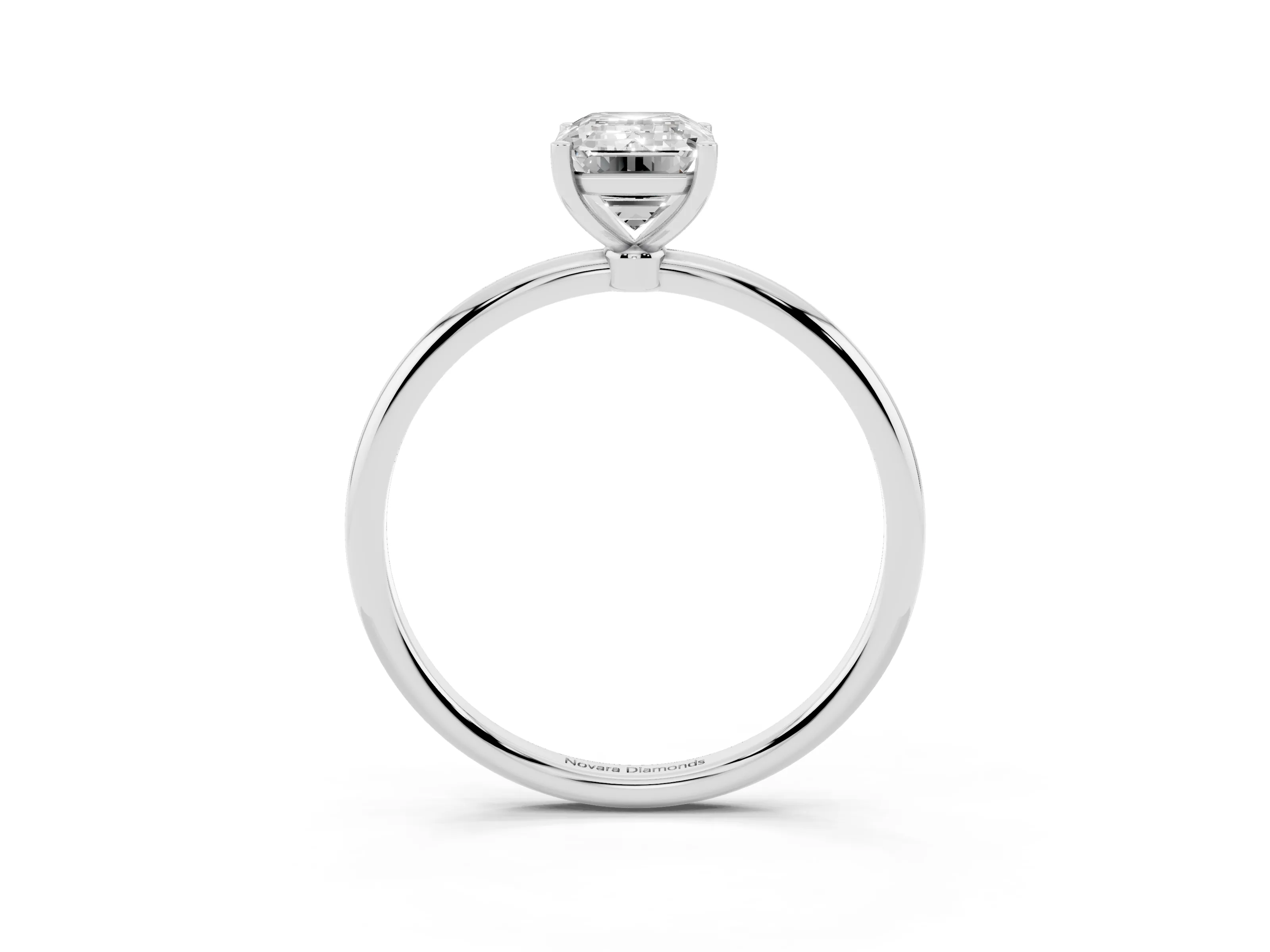 Emerald Cut Diamond Solitaire Engagement Ring Set in Platinum with Thin Band and Prong Setting