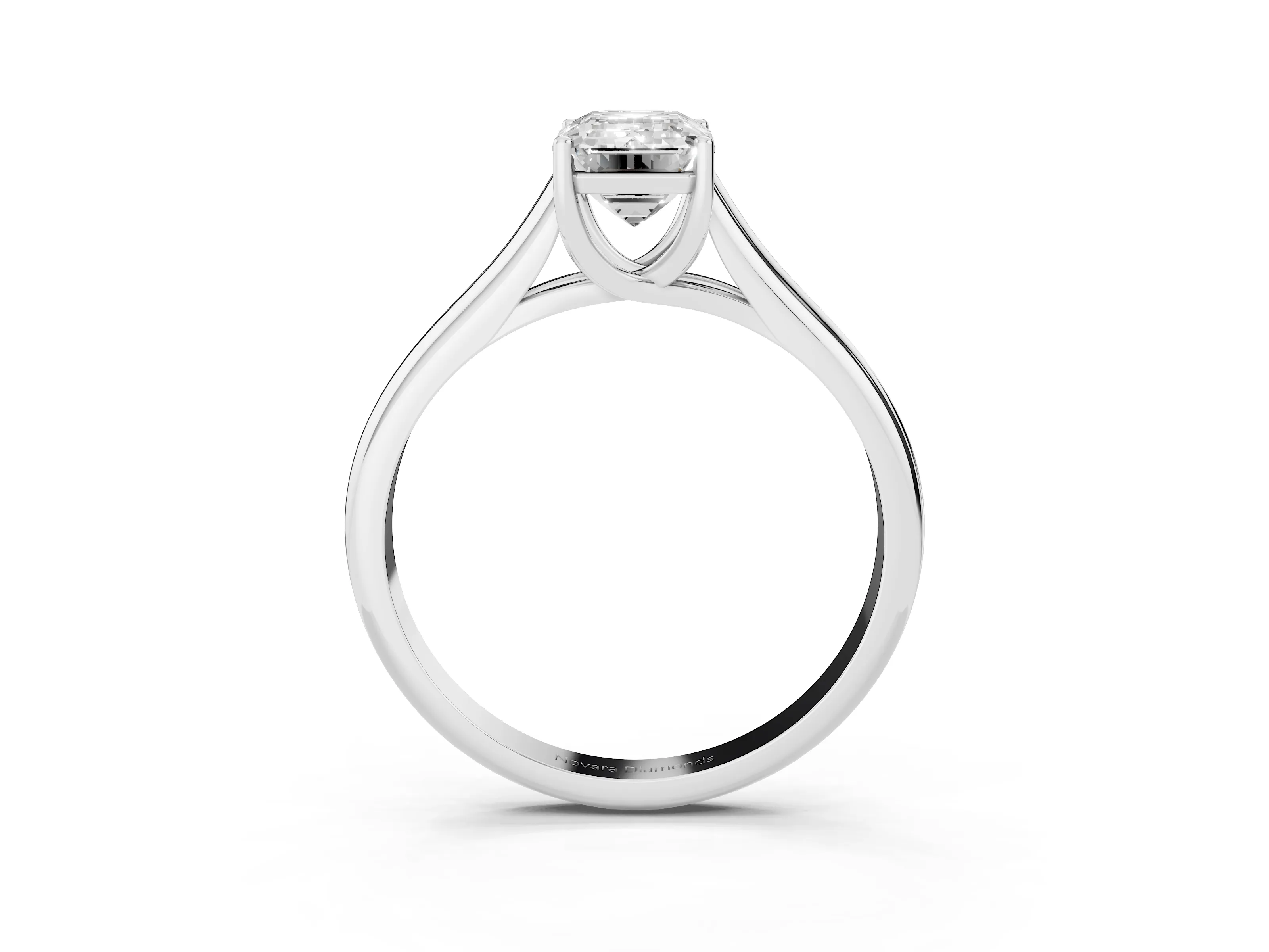 Emerald Cut Diamond Solitaire Engagement Ring Set in White gold with Subtly Tapered Band and Prong Setting