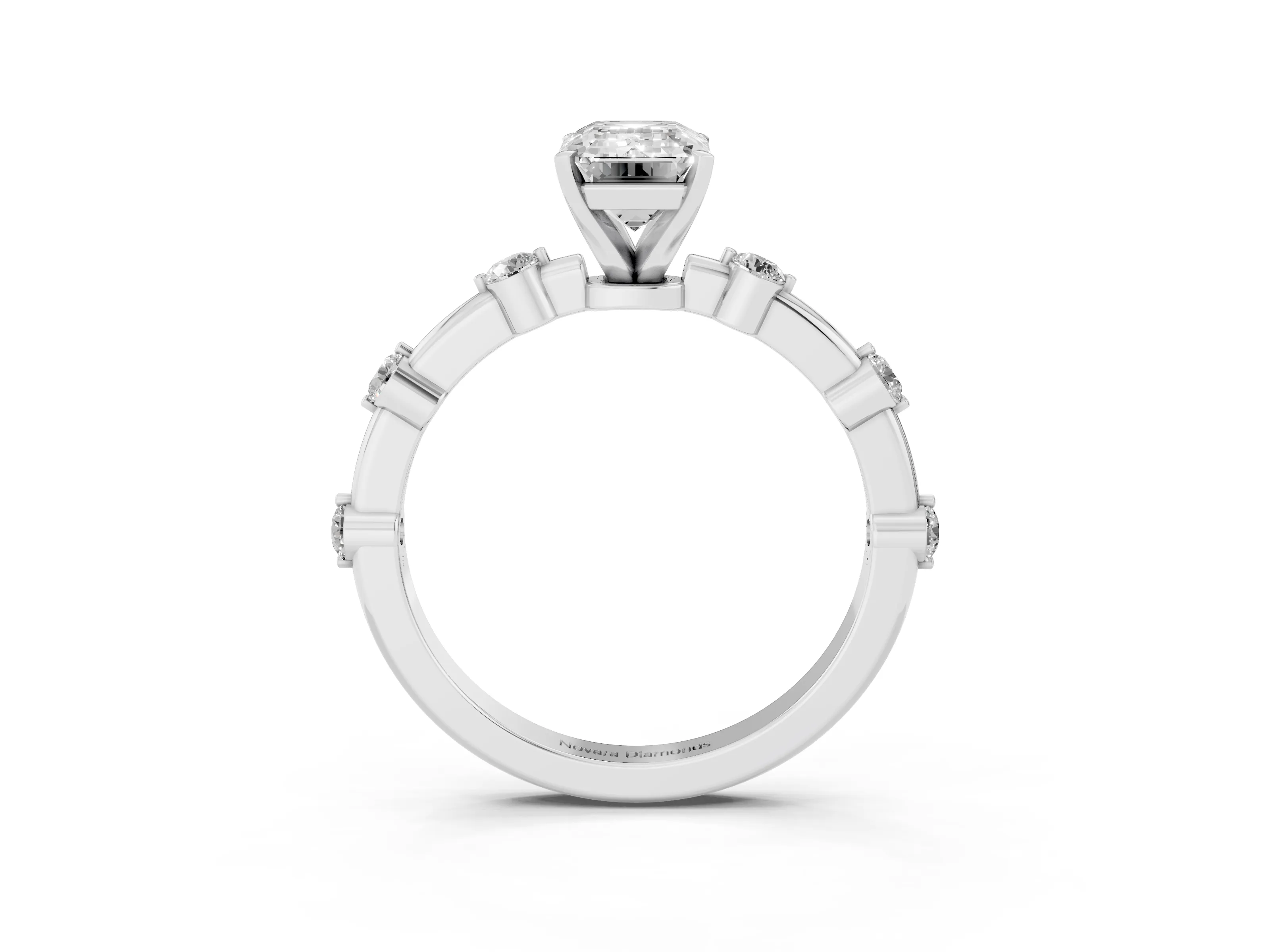 Emerald Cut Diamond Solitaire Ring Set in Silver with Bezel Set Side Stones and Prong Setting