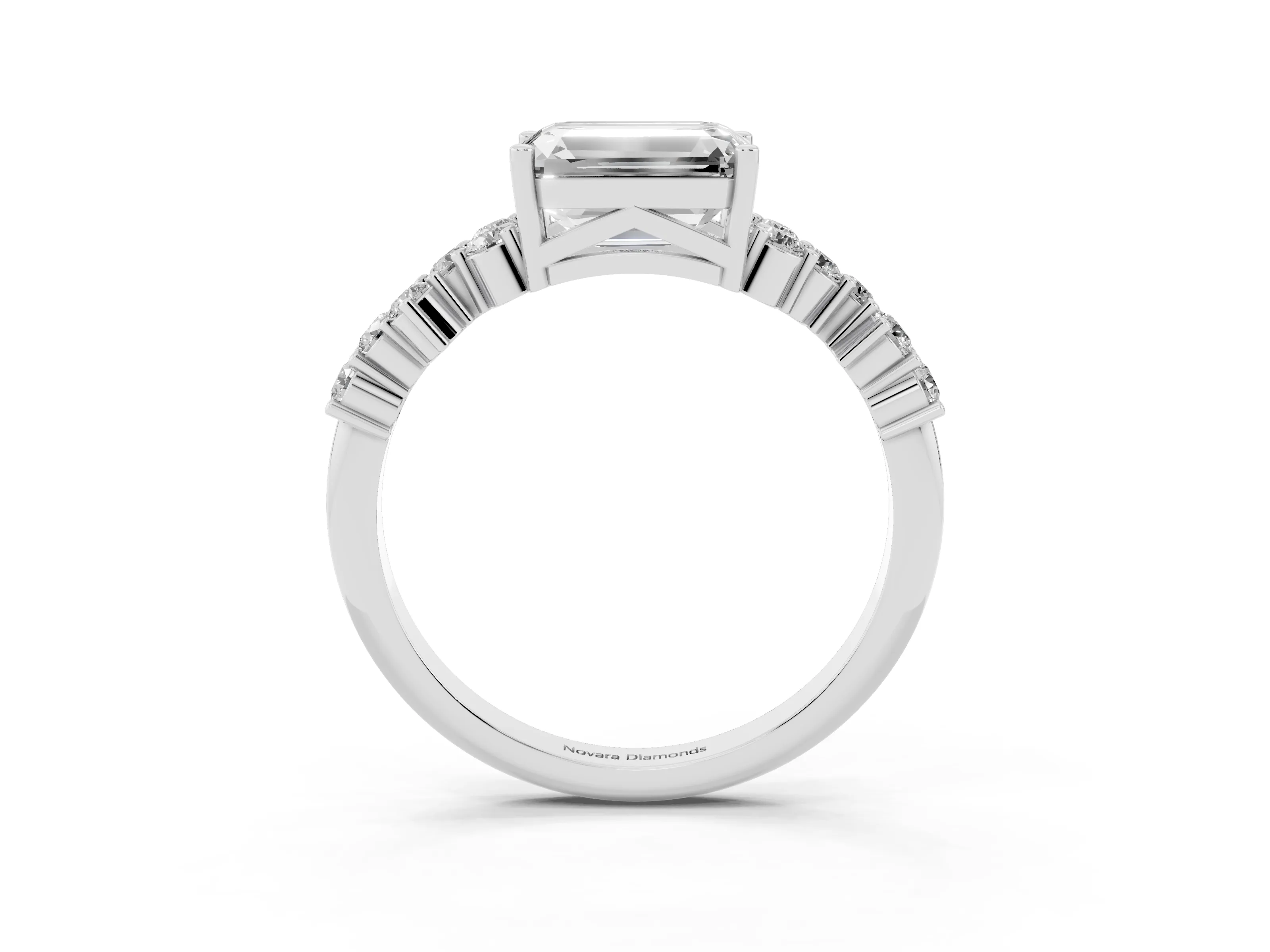 Emerald Cut Diamond Ring Set in Silver with Scattered Round Accents