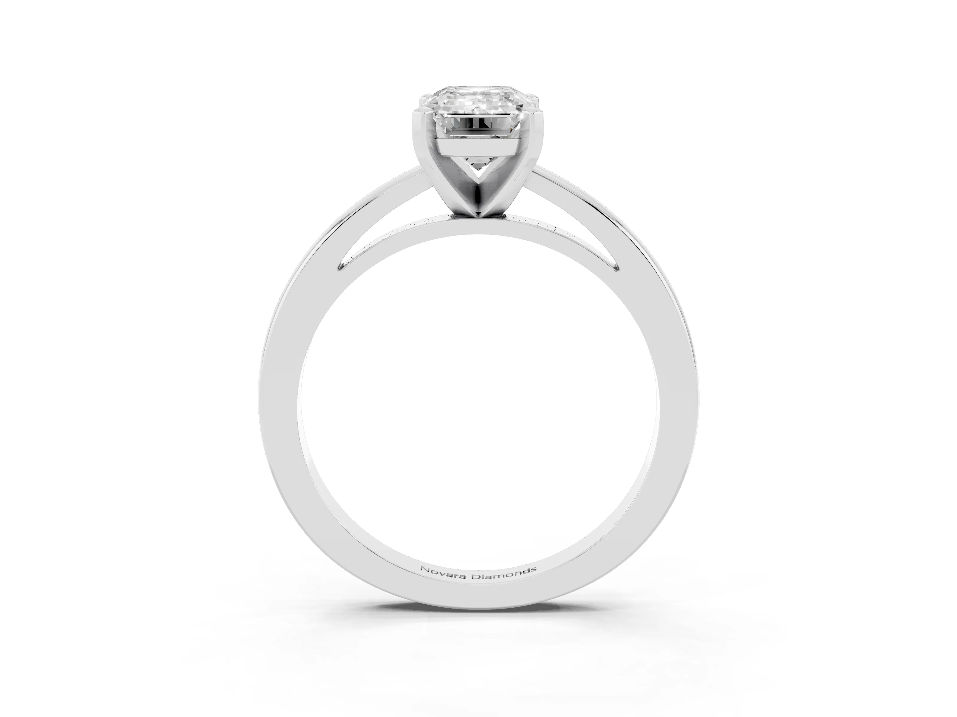 Emerald Cut Diamond Solitaire Engagement Ring Set in Platinum with Prong Setting on a Classic Band