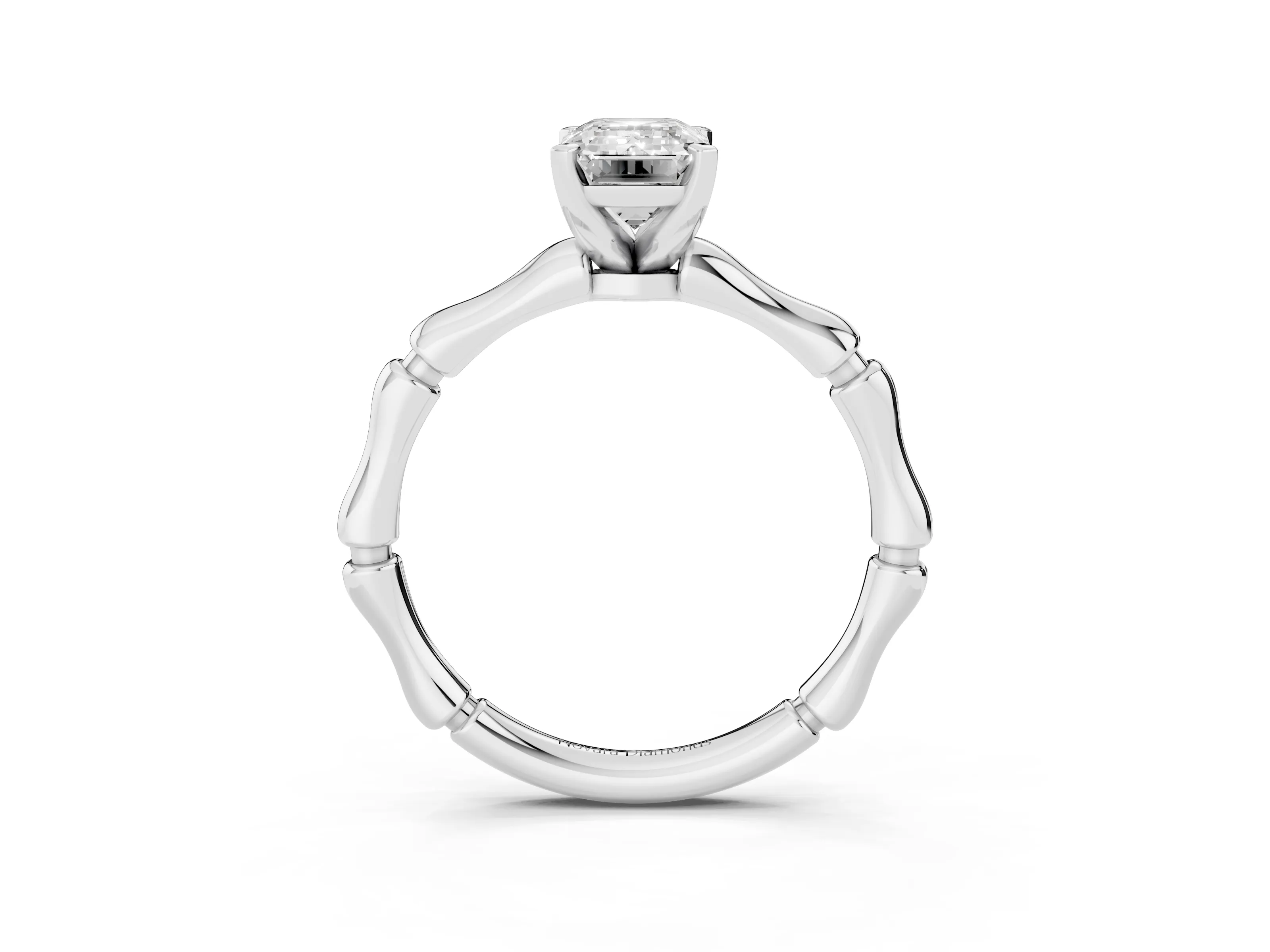 Emerald Cut Diamond Solitaire Ring Set in Silver with Bamboo Band and Prong Setting