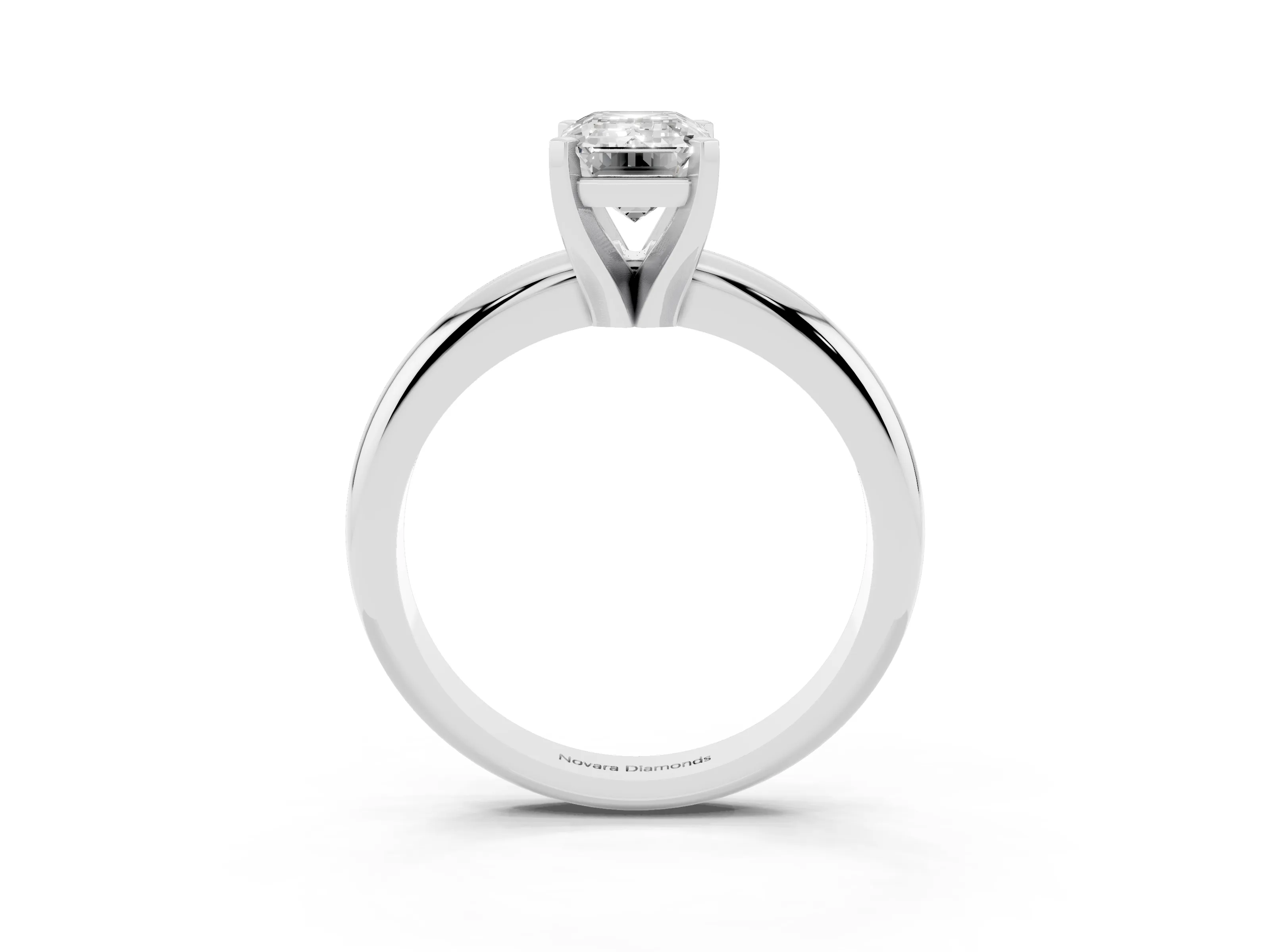 Emerald Cut Diamond Solitaire Engagement Ring Set in Platinum with Round Band and Prong Setting