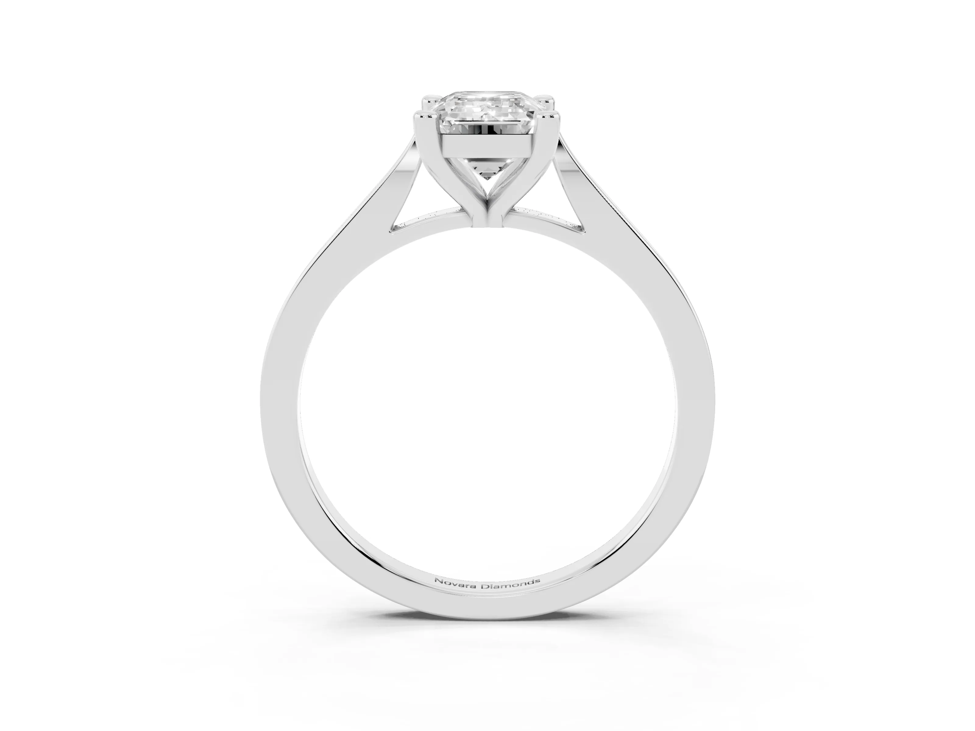 Emerald Cut Diamond Solitaire Ring Set in Platinum with Prong Setting and Tapered Band