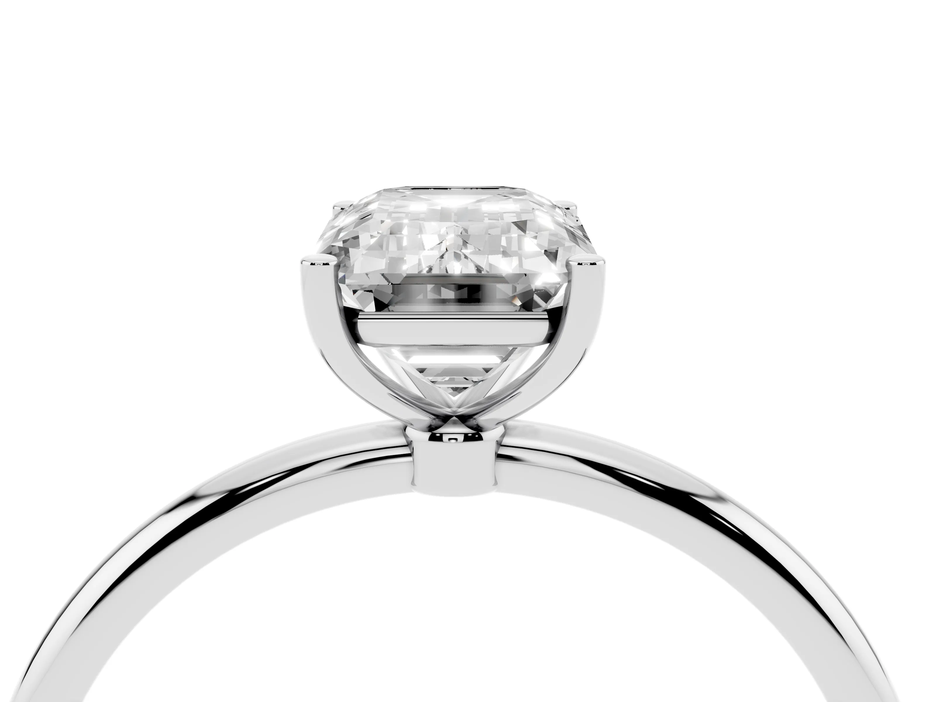 Emerald Cut Diamond Solitaire Engagement Ring Set in Platinum with Thin Band and Prong Setting