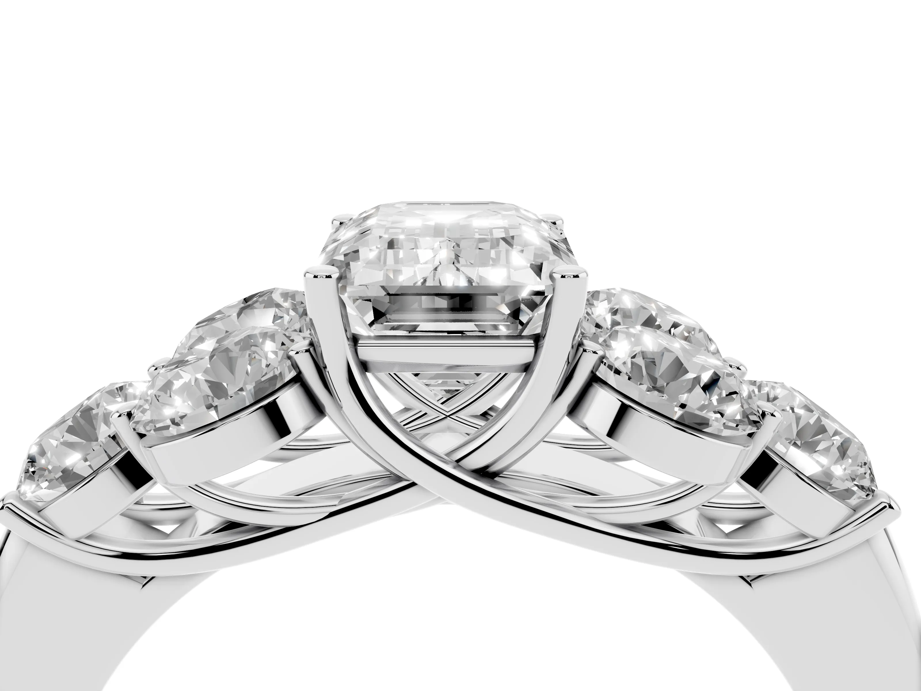 Emerald Cut Diamond Cluster Ring Set in Platinum with Round Accent Stones and Prong Setting on a Plain Band