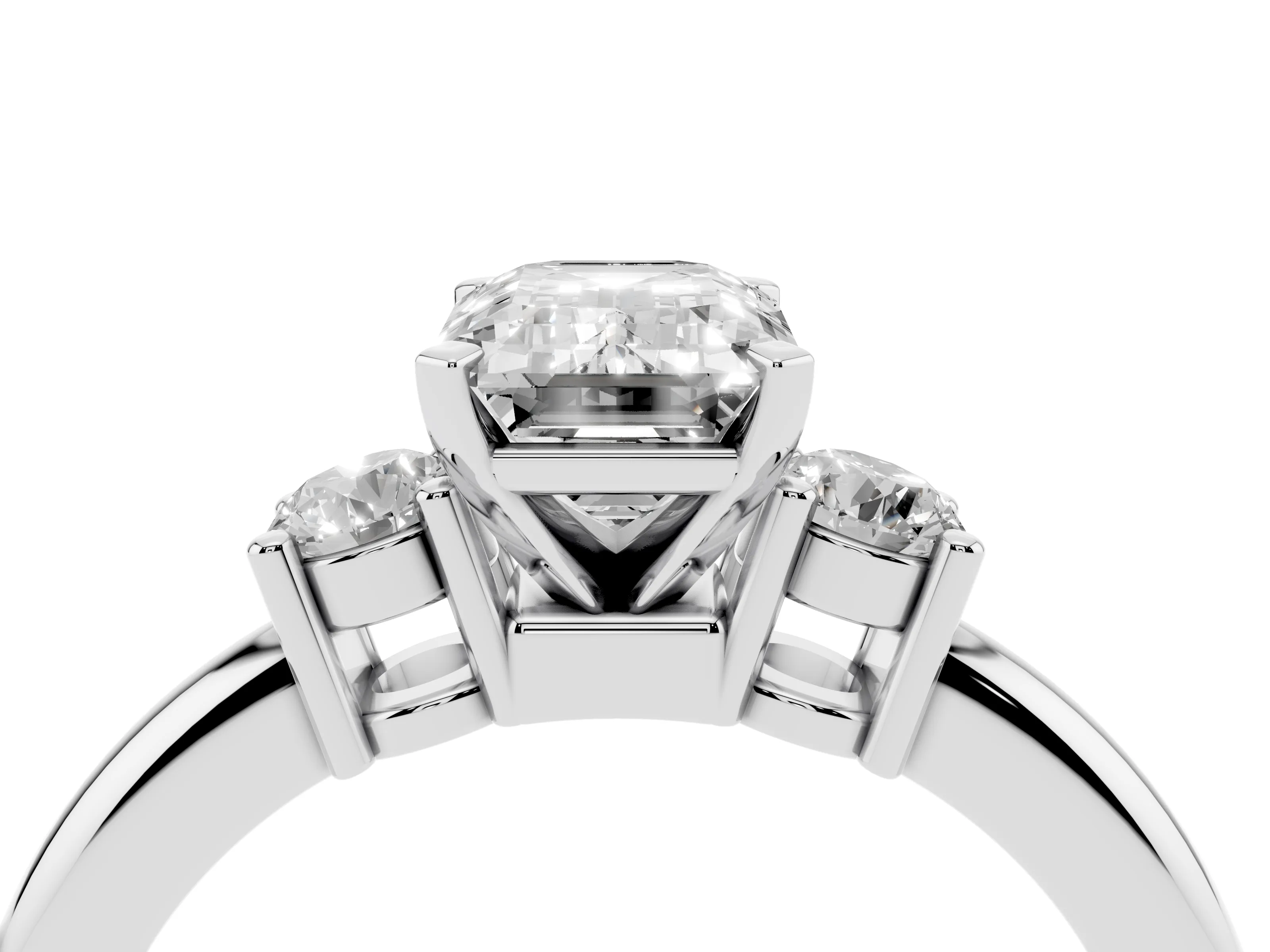 Three-Stone Emerald Cut Diamond Ring Set in Platinum with Prong Setting and Plain Band