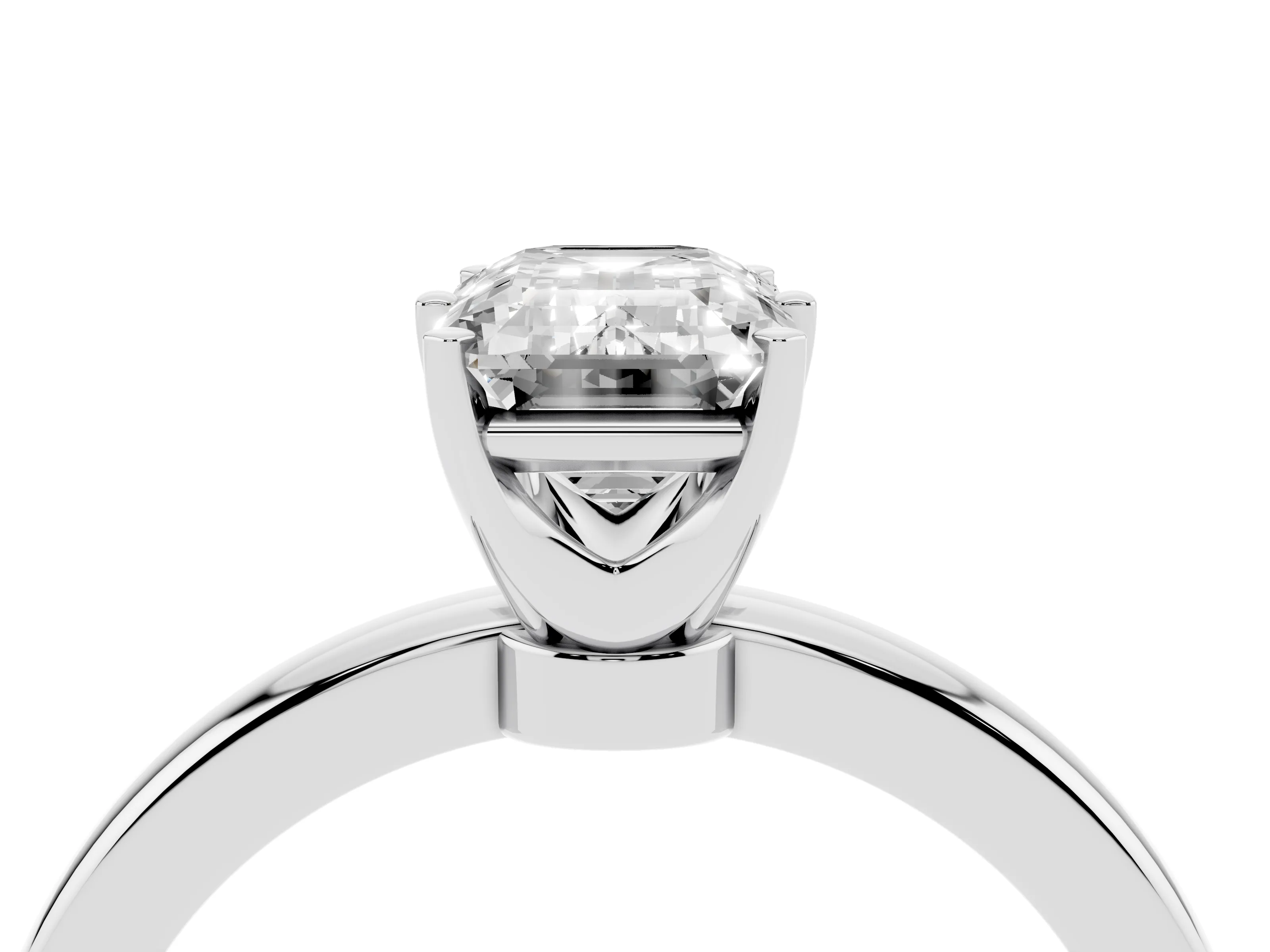 Emerald Cut Diamond Solitaire Ring Set in White gold with Raised Prong Setting on a Classic Band