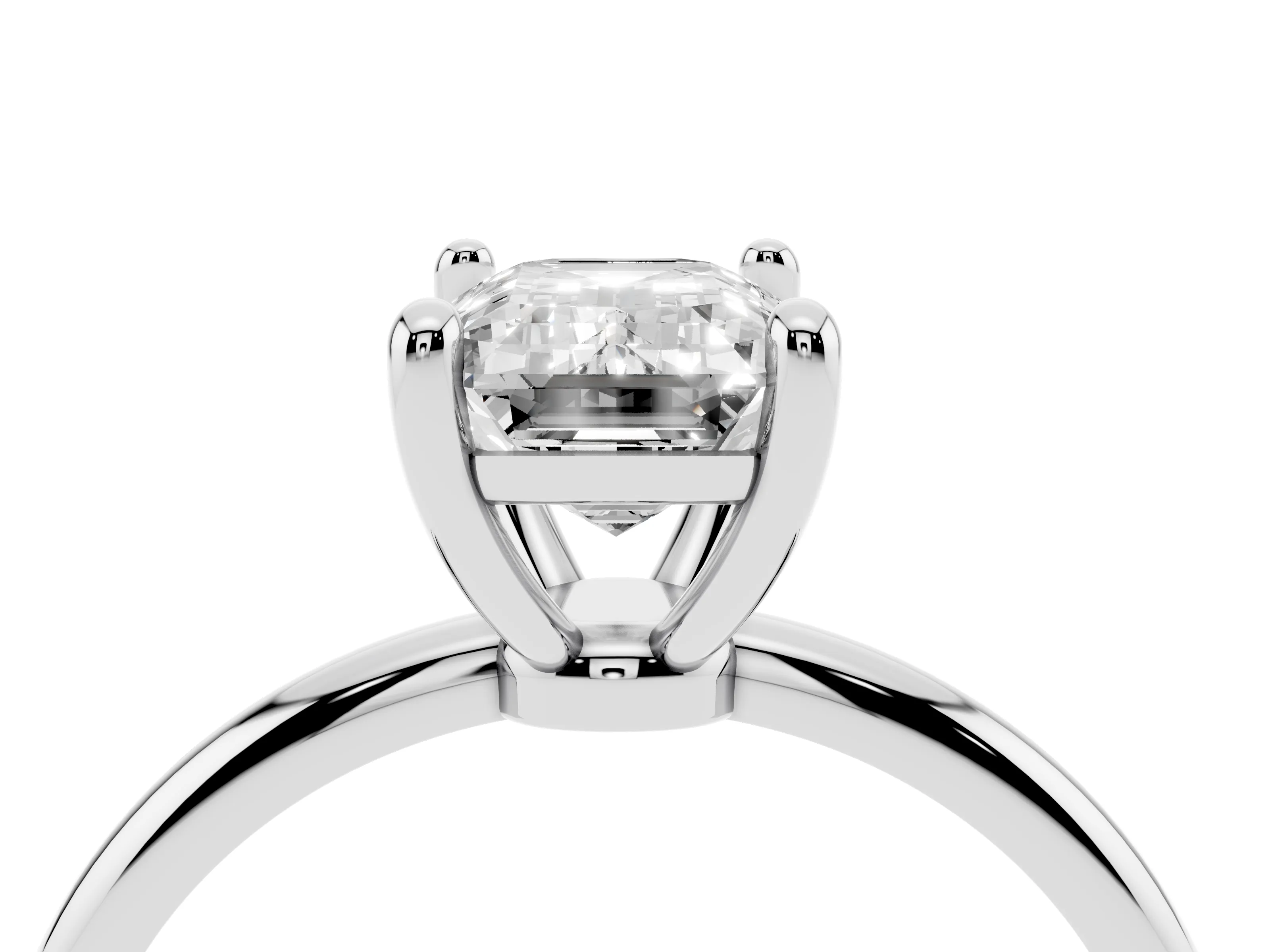 Emerald Cut Diamond Solitaire Ring Set in Silver with Secure Prong Setting on a Classic Band