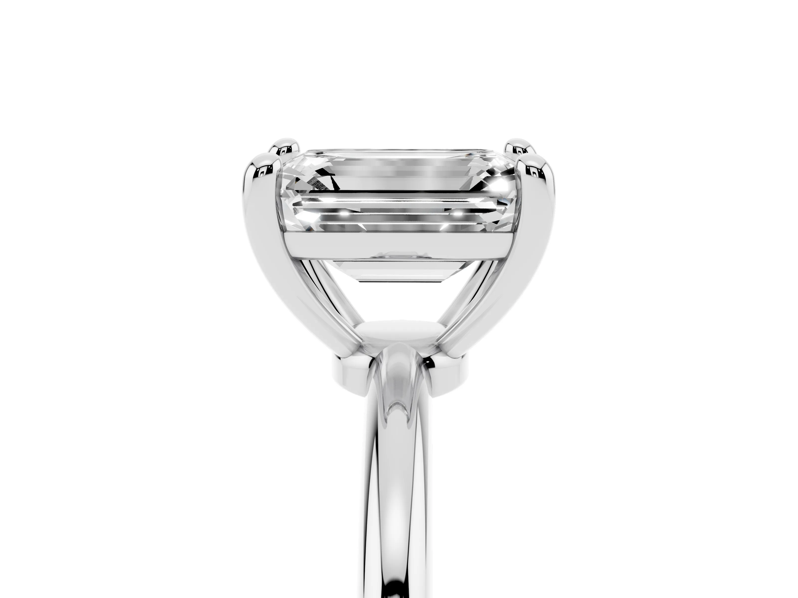 Emerald Cut Diamond Solitaire Ring Set in Silver with Secure Prong Setting on a Classic Band