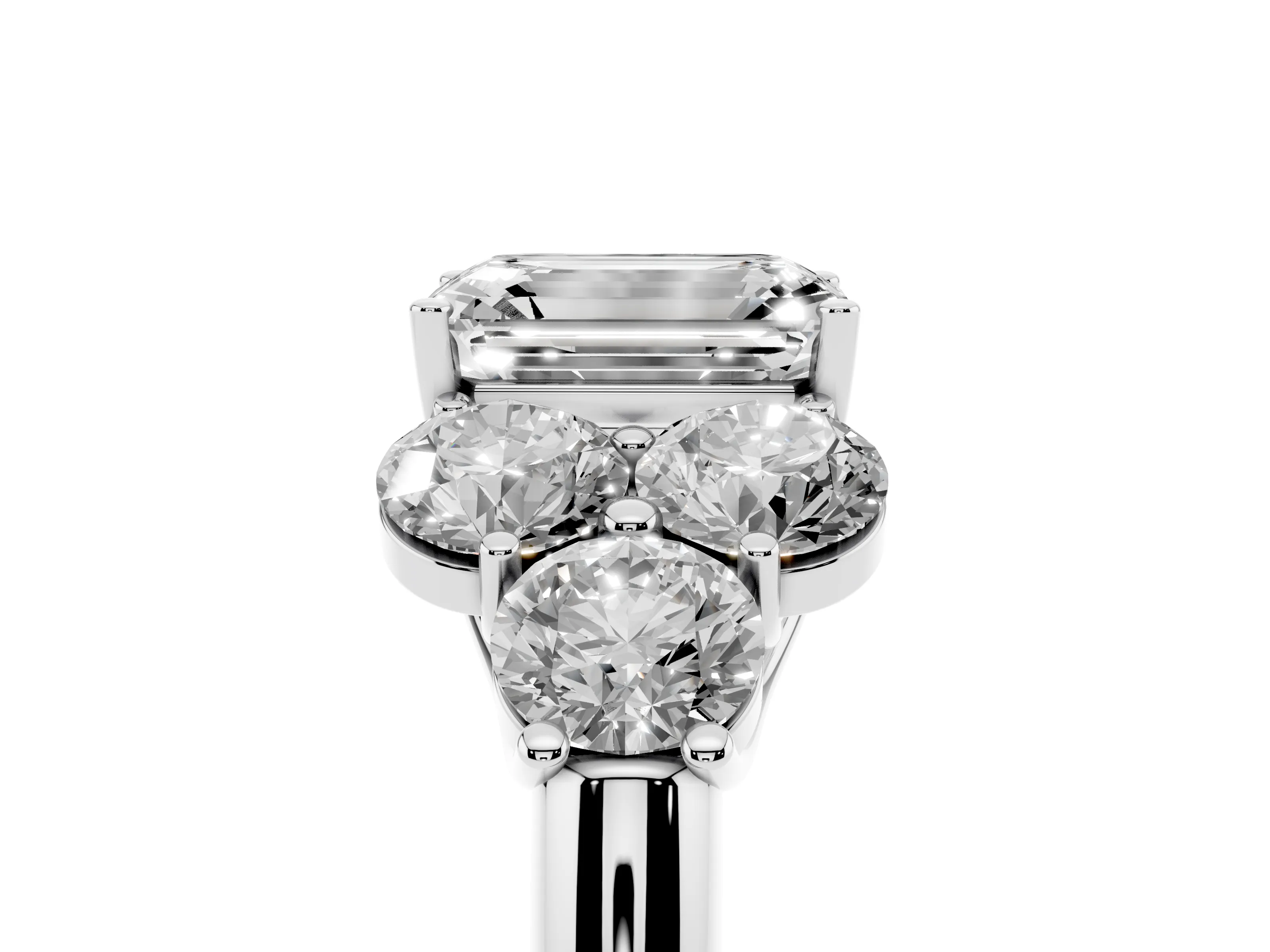 Emerald Cut Diamond Cluster Ring Set in Platinum with Round Accent Stones and Prong Setting on a Plain Band