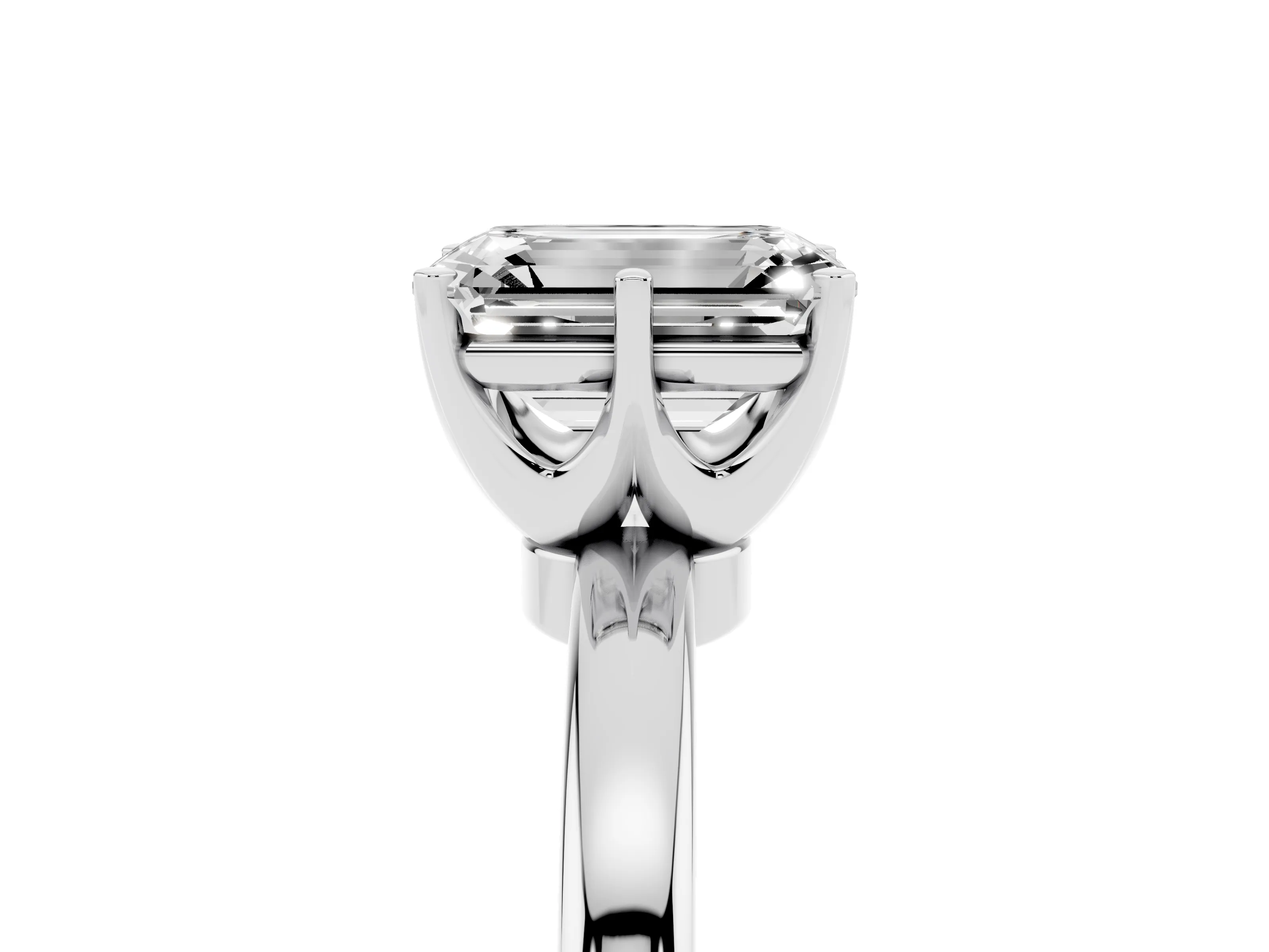 Emerald Cut Diamond Solitaire Ring Set in White gold with Raised Prong Setting on a Classic Band
