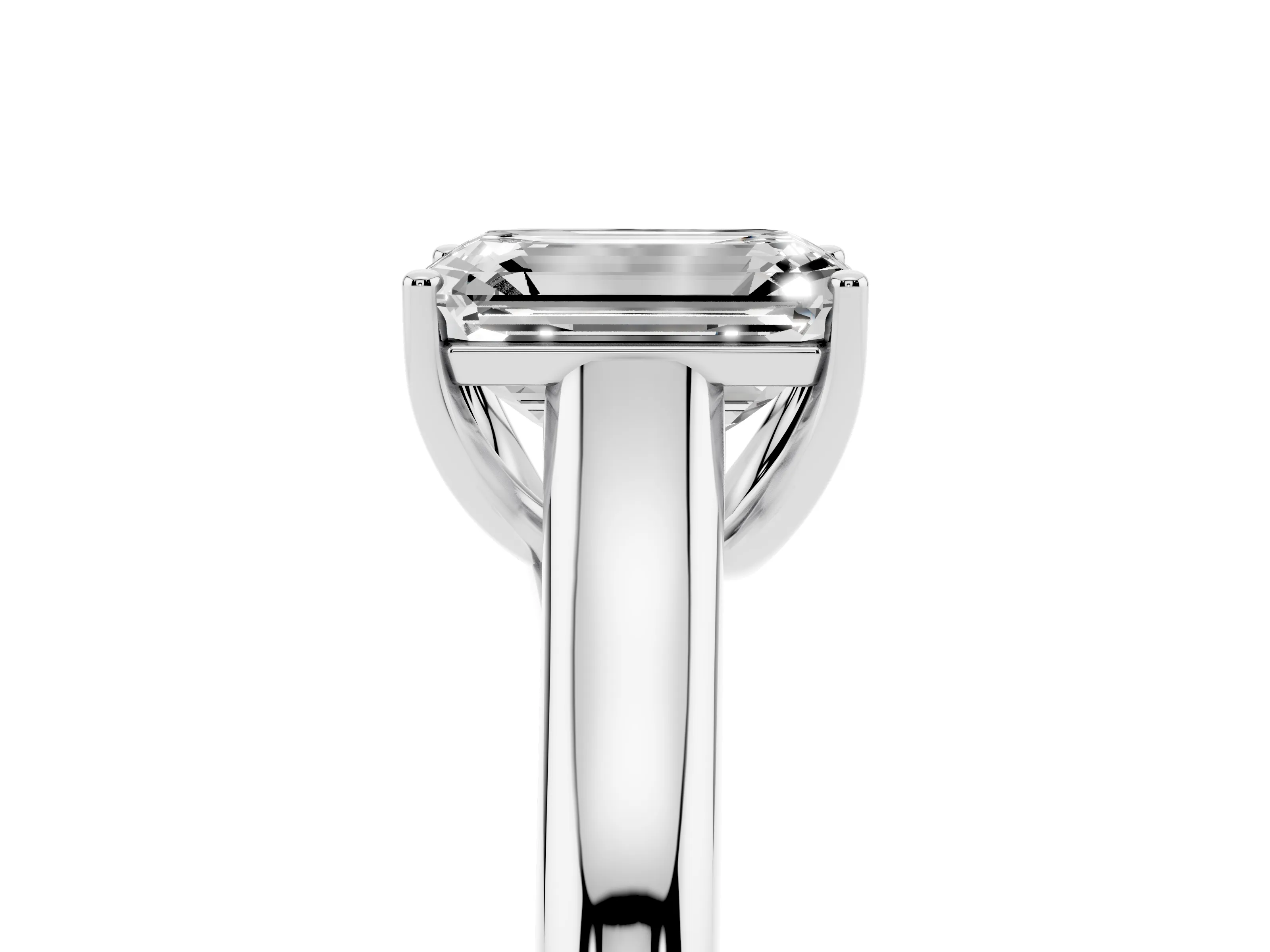Emerald Cut Diamond Solitaire Engagement Ring Set in White gold with Subtly Tapered Band and Prong Setting