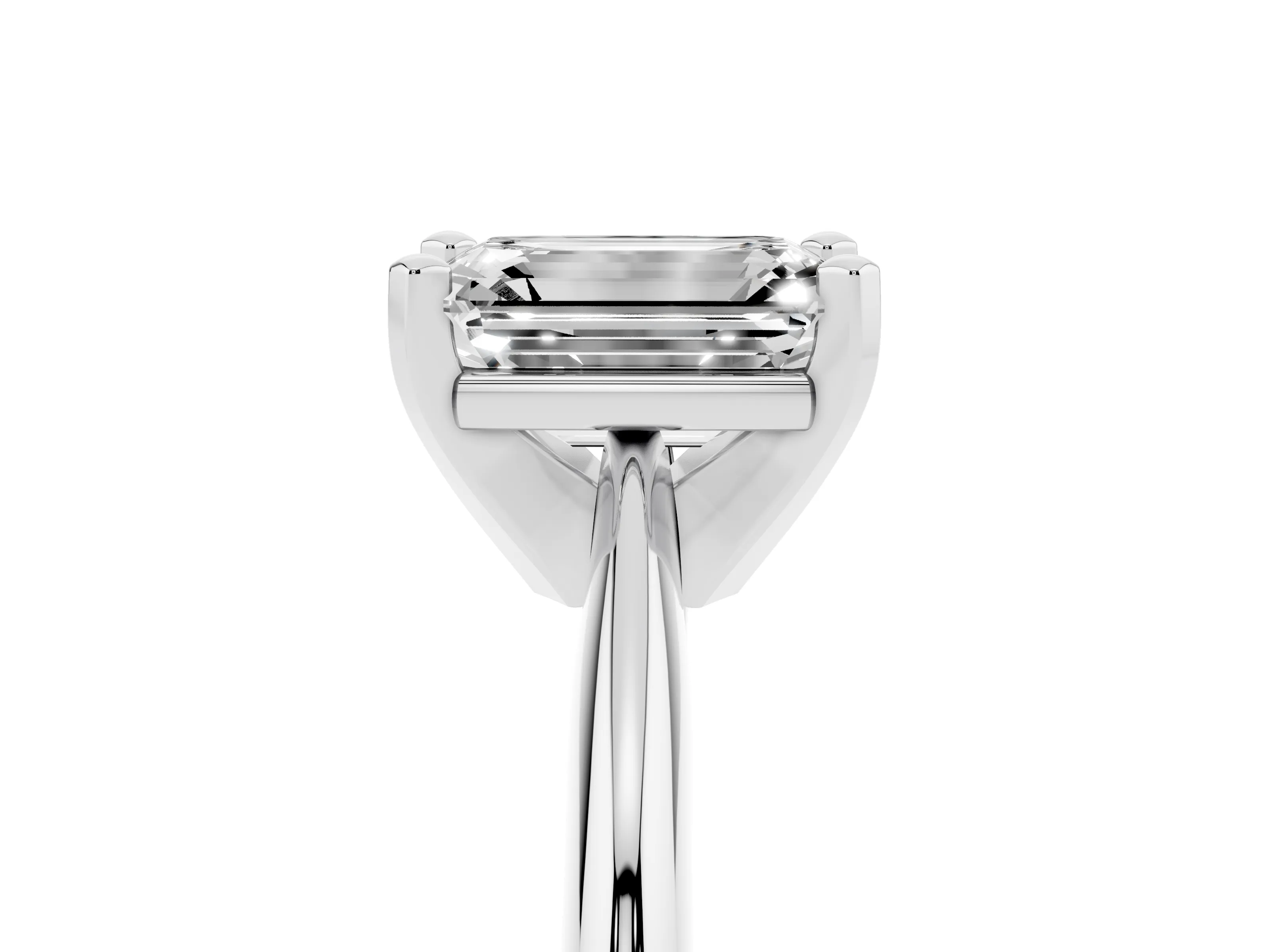 Emerald Cut Diamond Solitaire Ring Set in Silver with Prong Setting on a Plain Round Band