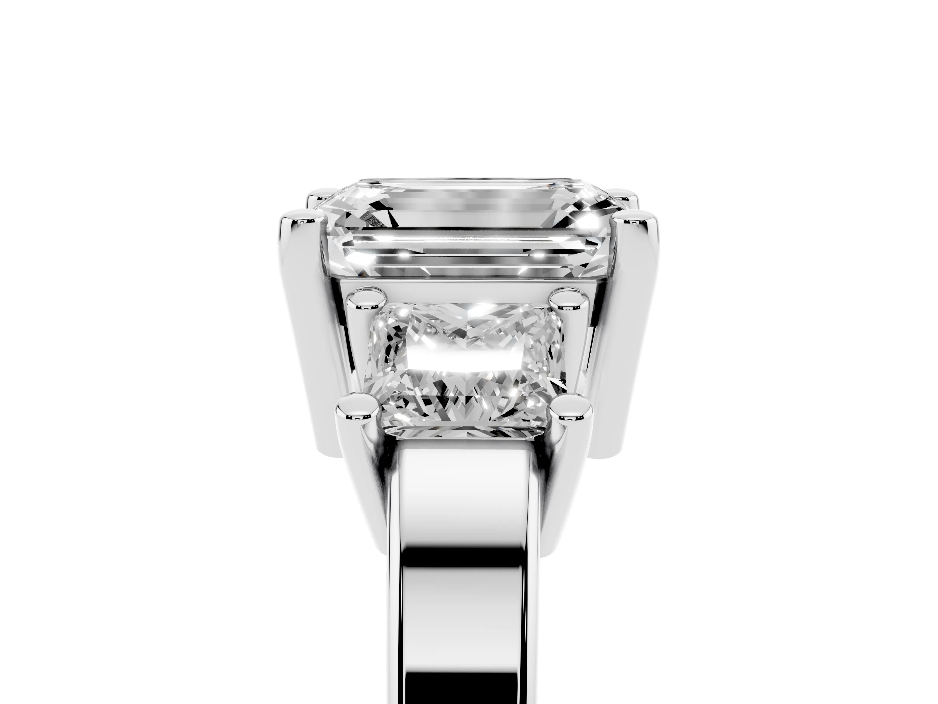 Three-Stone Emerald Cut Diamond Solitaire Ring Set in Platinum with Prong Setting