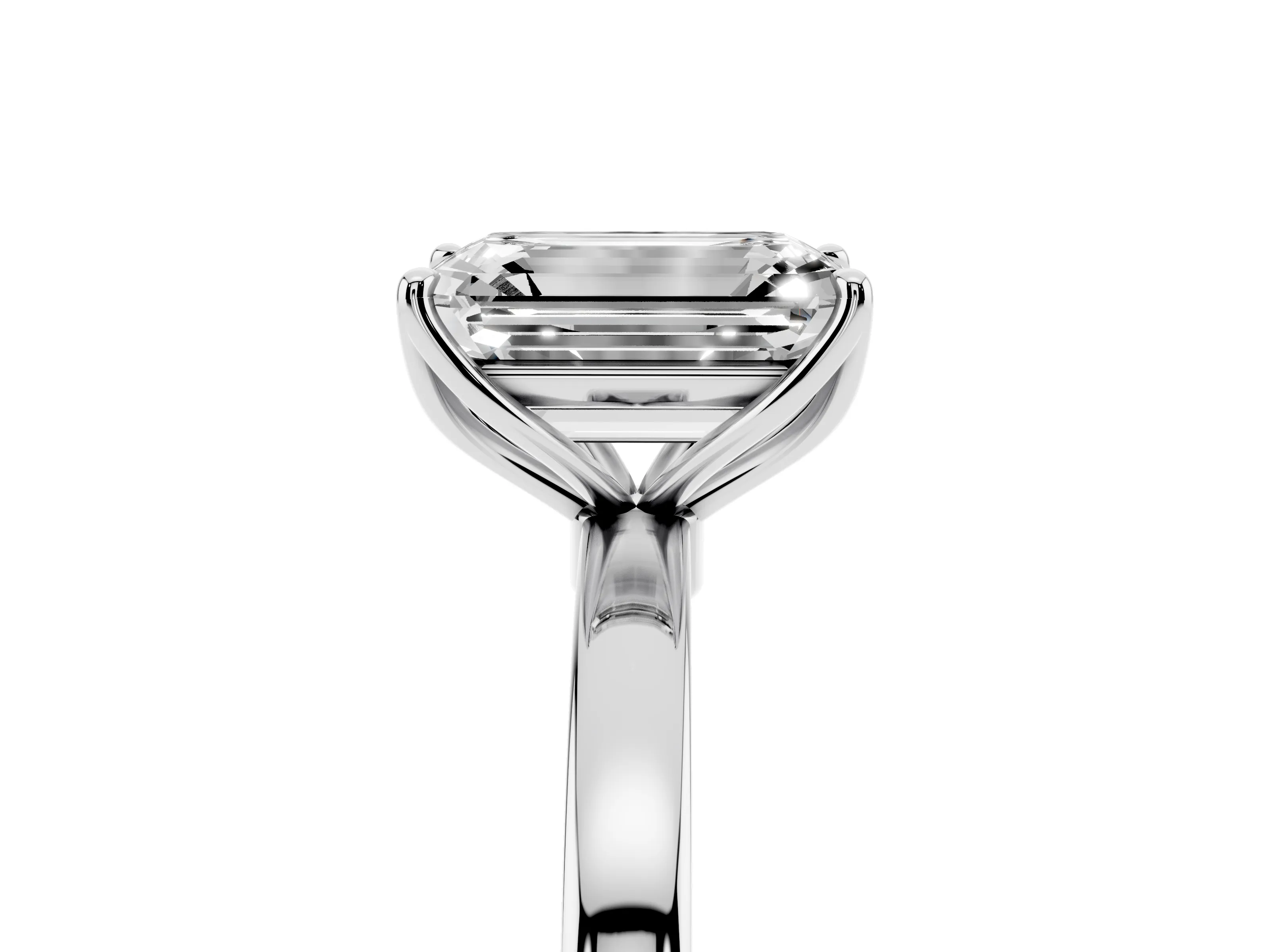 Emerald Cut Diamond Solitaire Ring Set in White gold with Prong Setting and Thin Polished Band