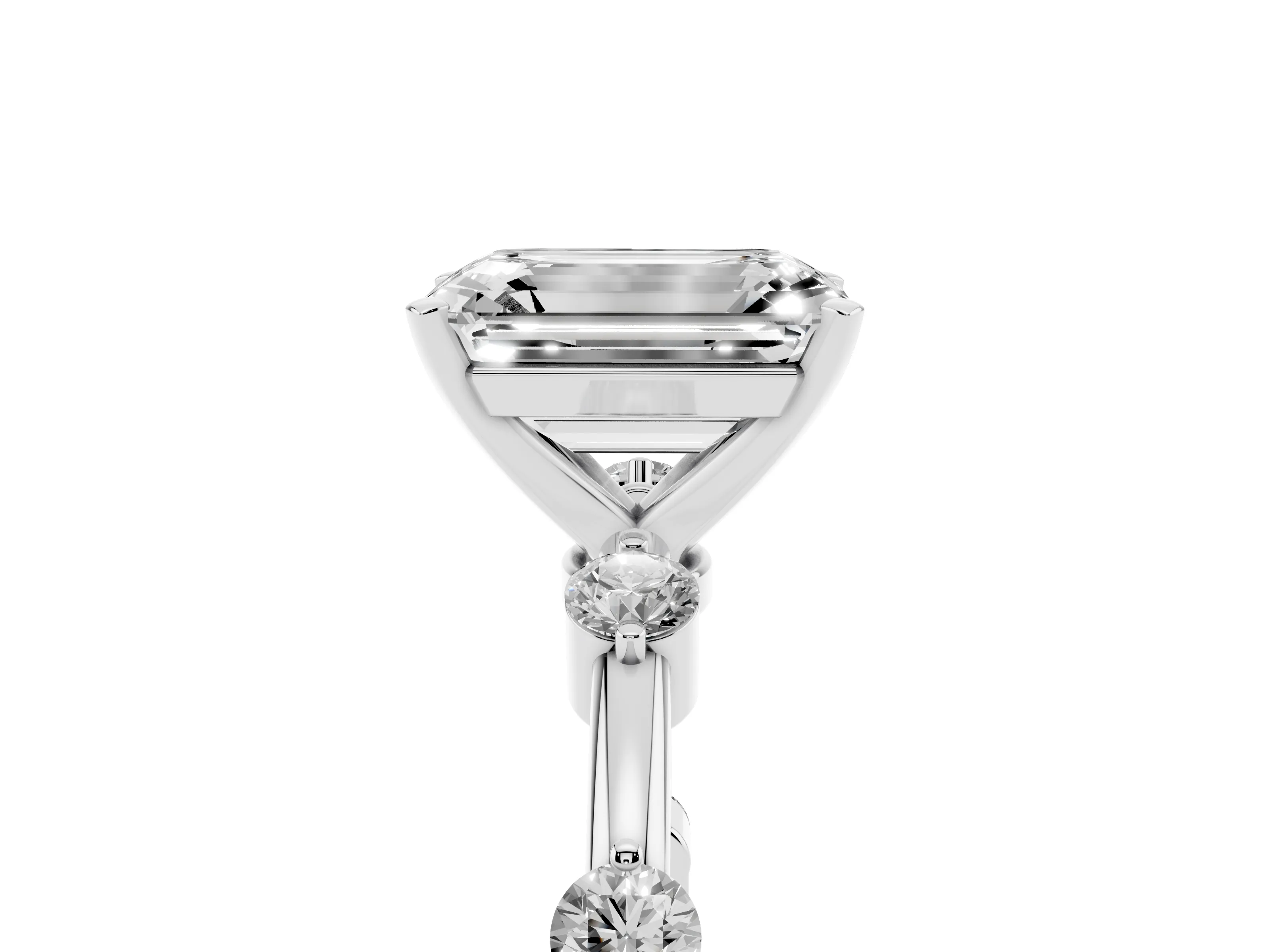 Emerald Cut Diamond Solitaire Ring Set in Silver with Bezel Set Side Stones and Prong Setting