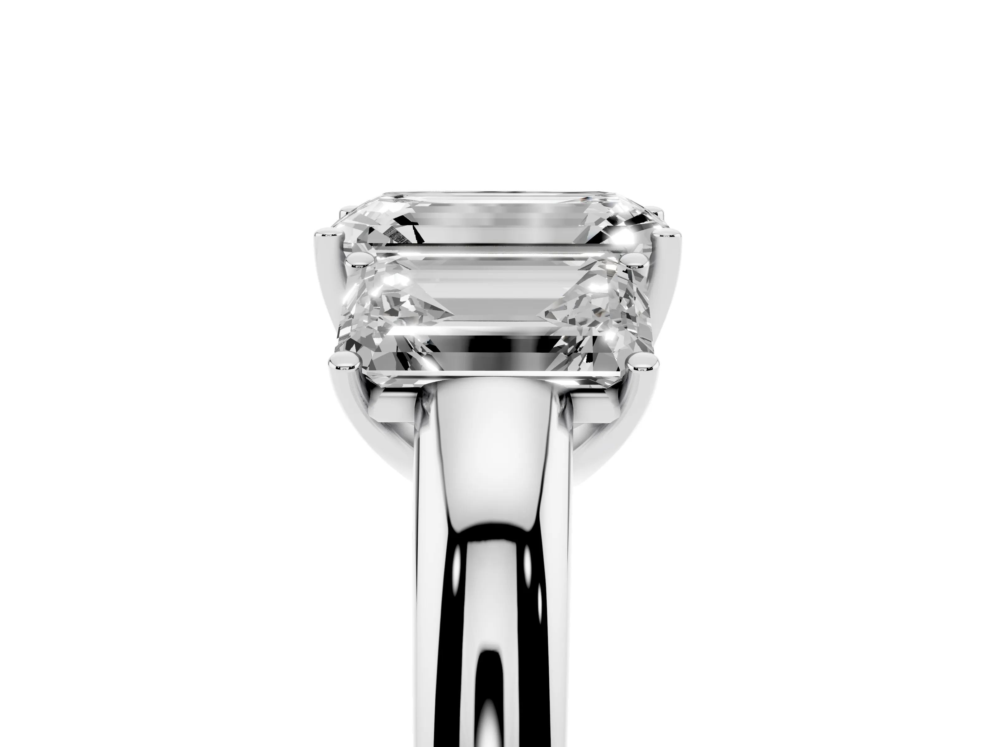 Emerald Cut Diamond Three-Stone Ring Set in Platinum with Bold Center and Classic Band