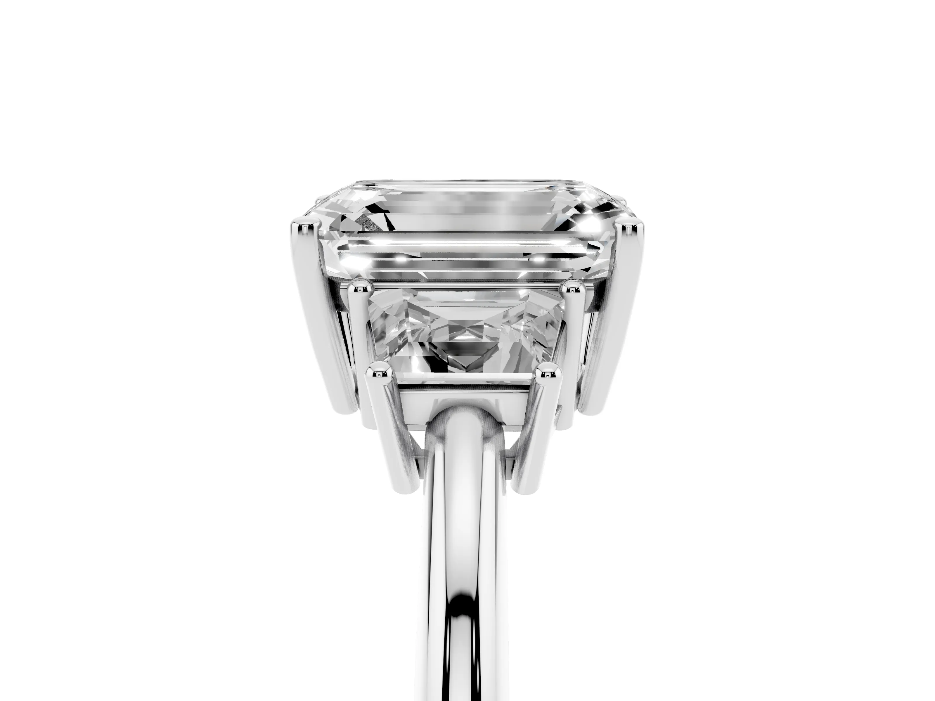 Emerald Cut Diamond Three-Stone Ring Set in Platinum with Trapezoid Side Stones and Prong Setting