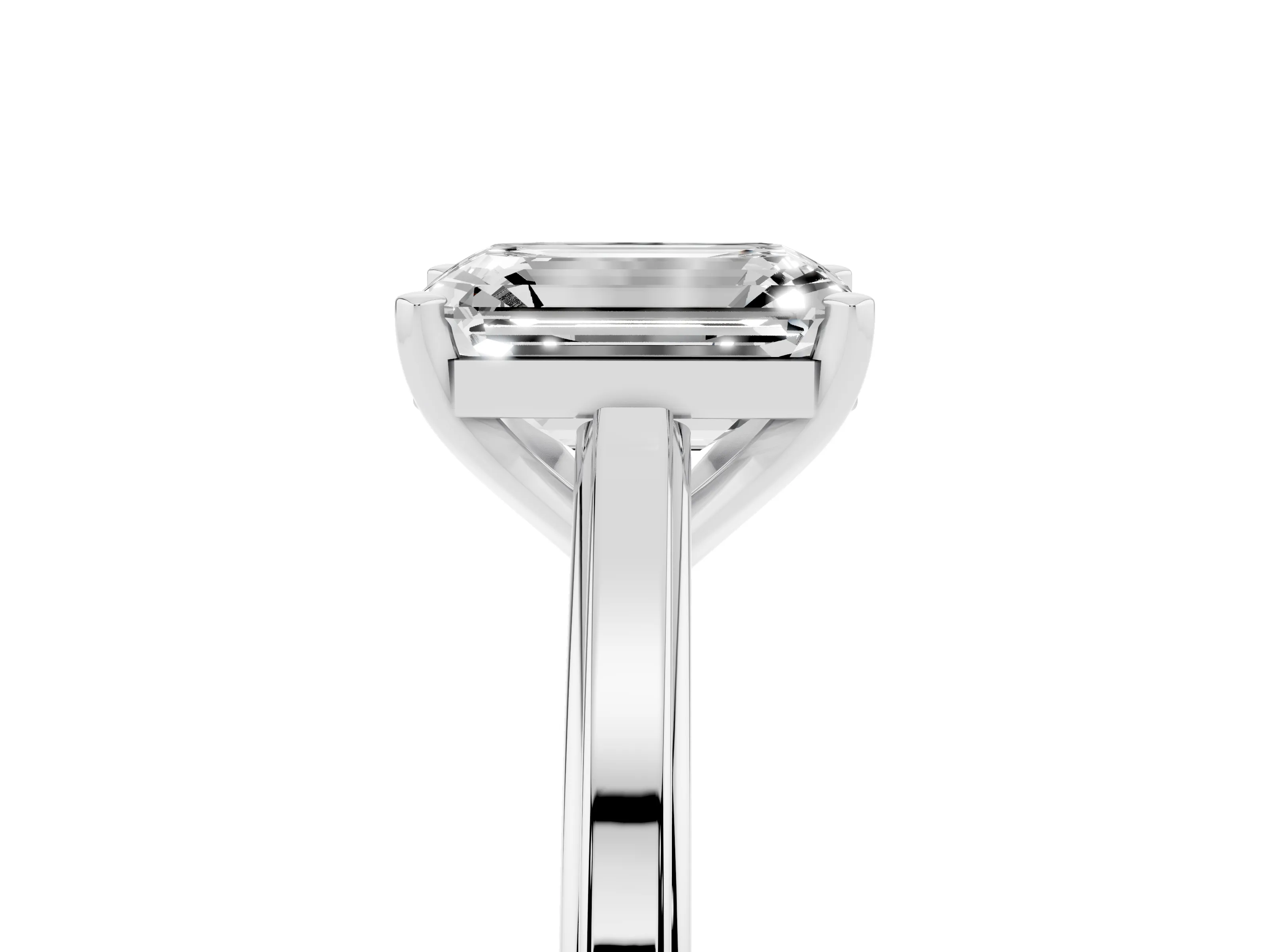 Emerald Cut Diamond Solitaire Ring Set in Platinum with Prong Setting and Classic Band