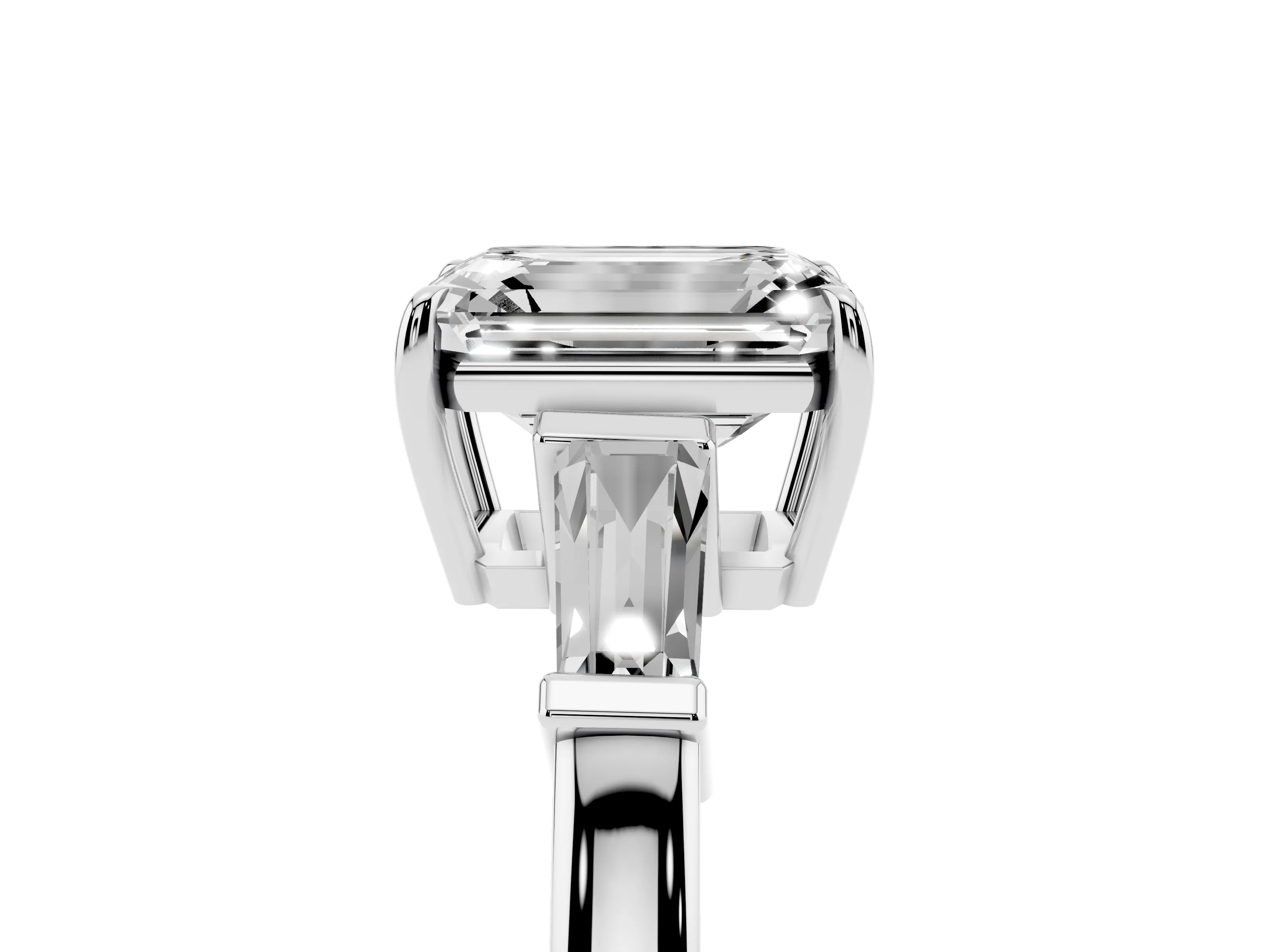 Emerald Cut Diamond Three-Stone Ring Set in Platinum with Tapered Baguette Side Stones and Prong Setting