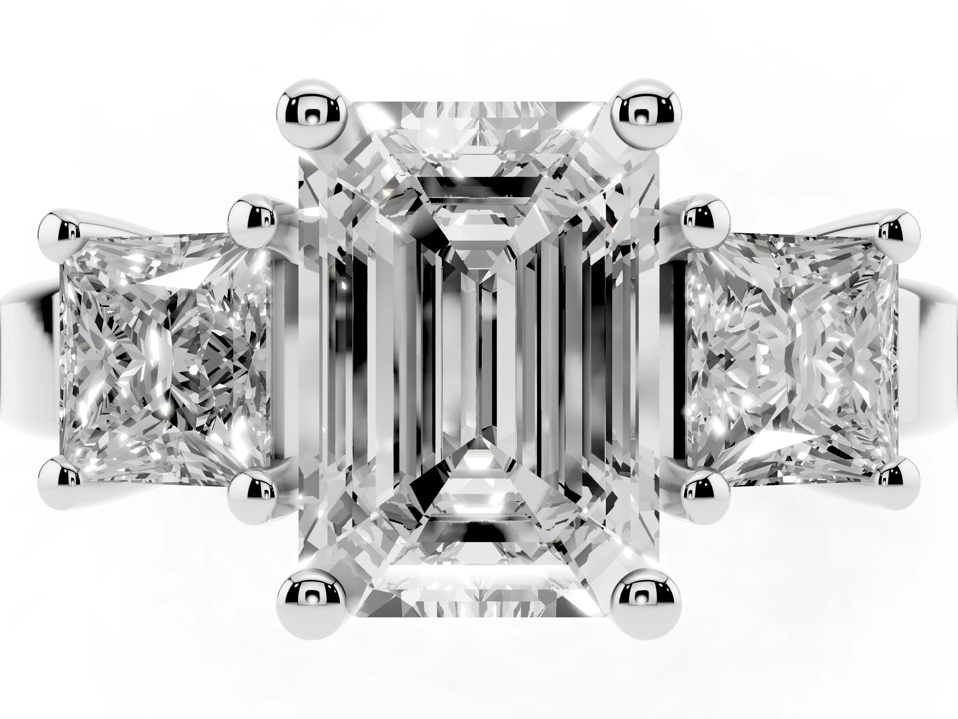 Three-Stone Emerald Cut Diamond Solitaire Ring Set in Platinum with Prong Setting