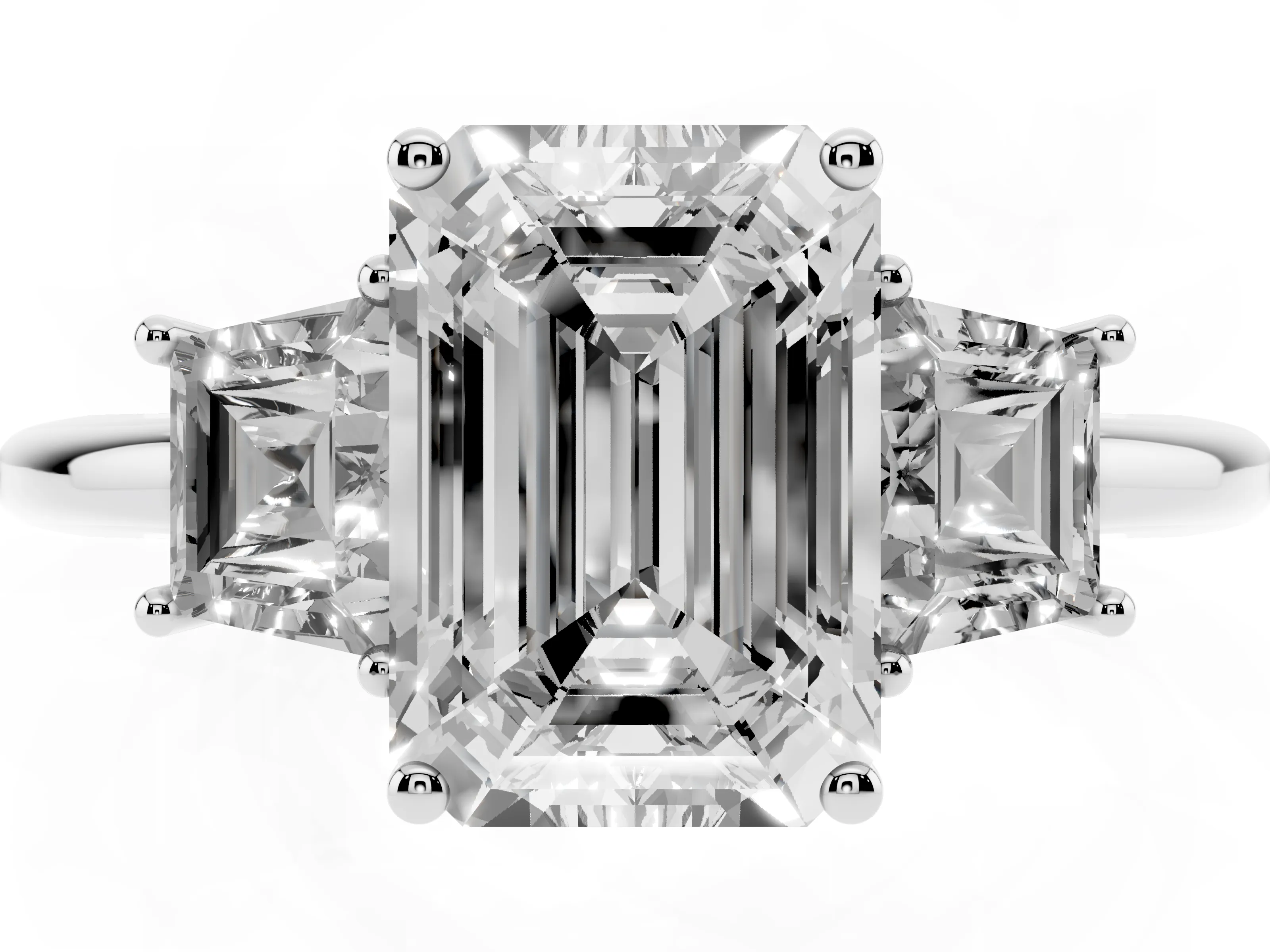 Emerald Cut Diamond Three-Stone Ring Set in Platinum with Trapezoid Side Stones and Prong Setting