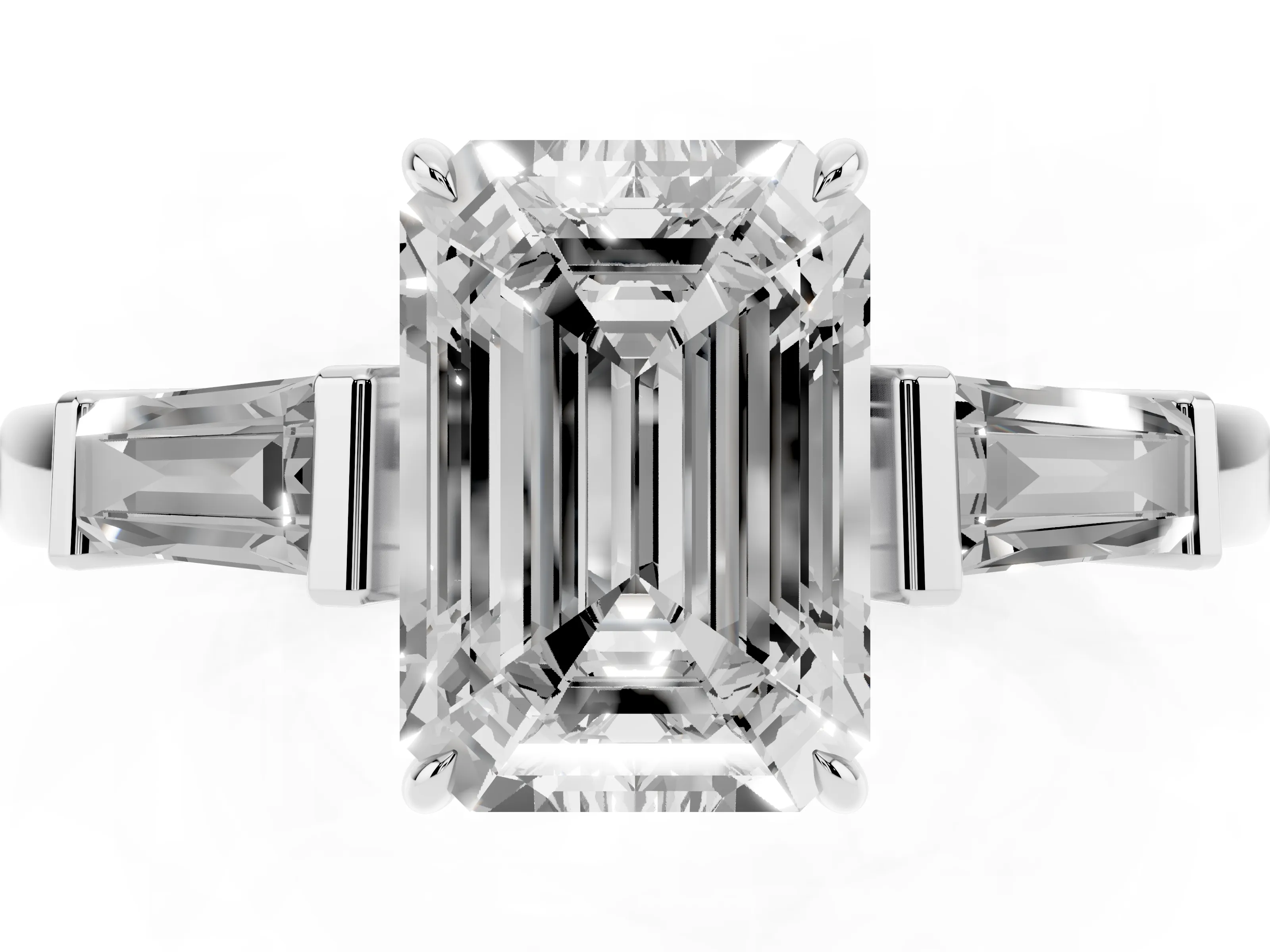 Emerald Cut Diamond Three-Stone Ring Set in Platinum with Tapered Baguette Side Stones and Prong Setting