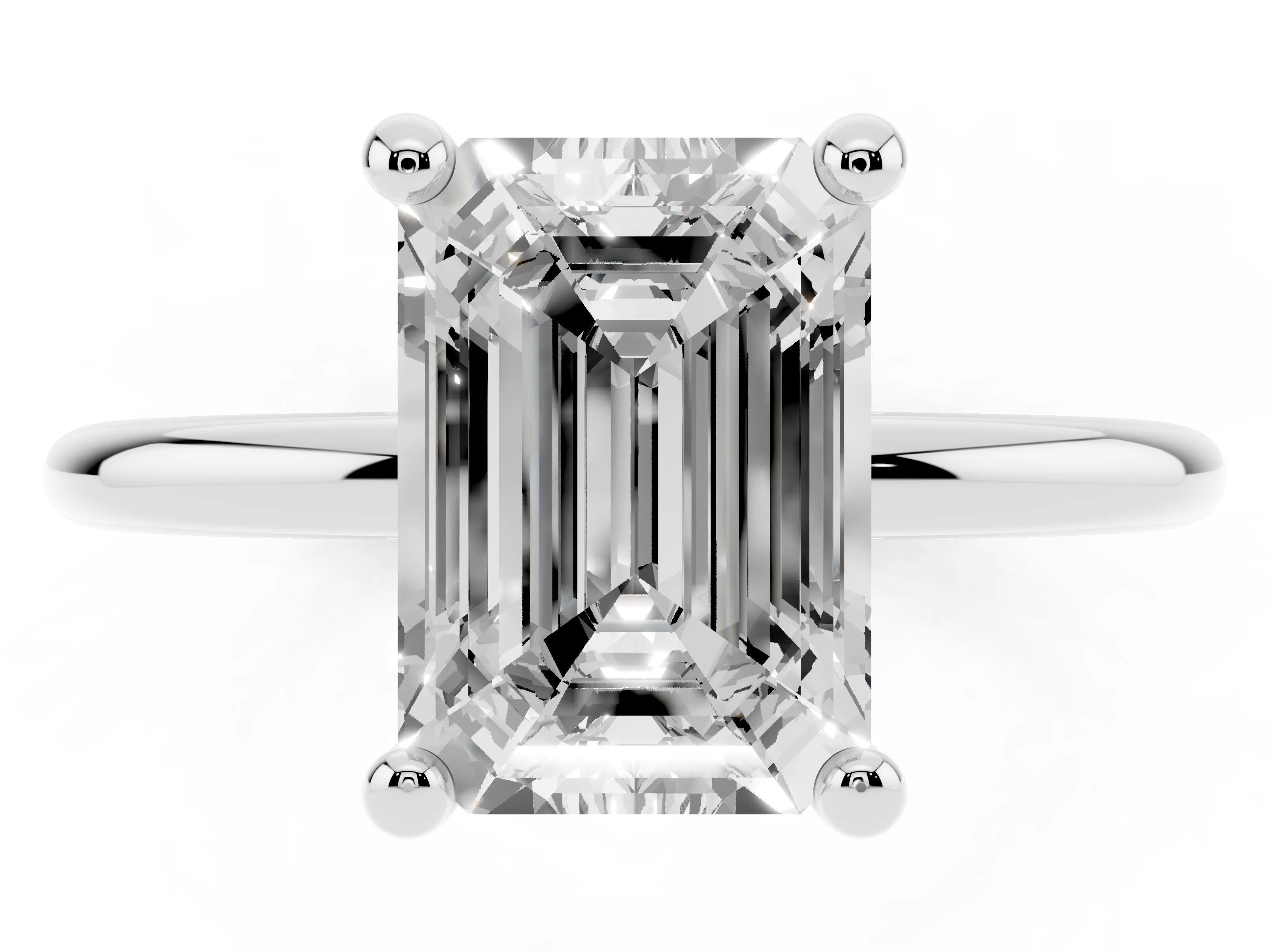 Emerald Cut Diamond Solitaire Ring Set in Silver with Secure Prong Setting on a Classic Band