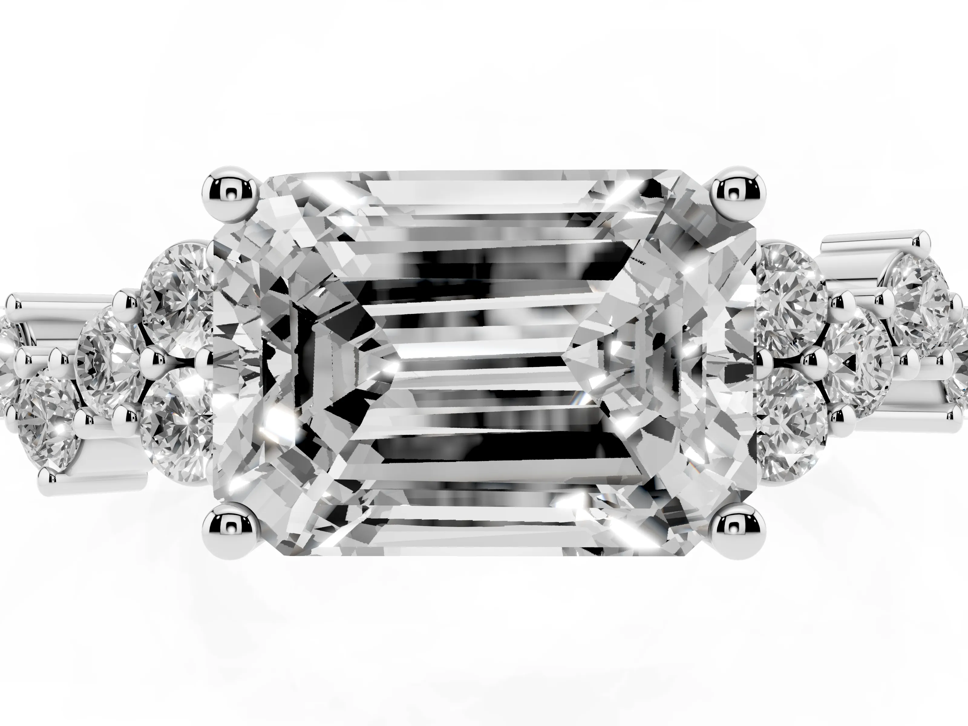 Emerald Cut Diamond Ring Set in Silver with Scattered Round Accents