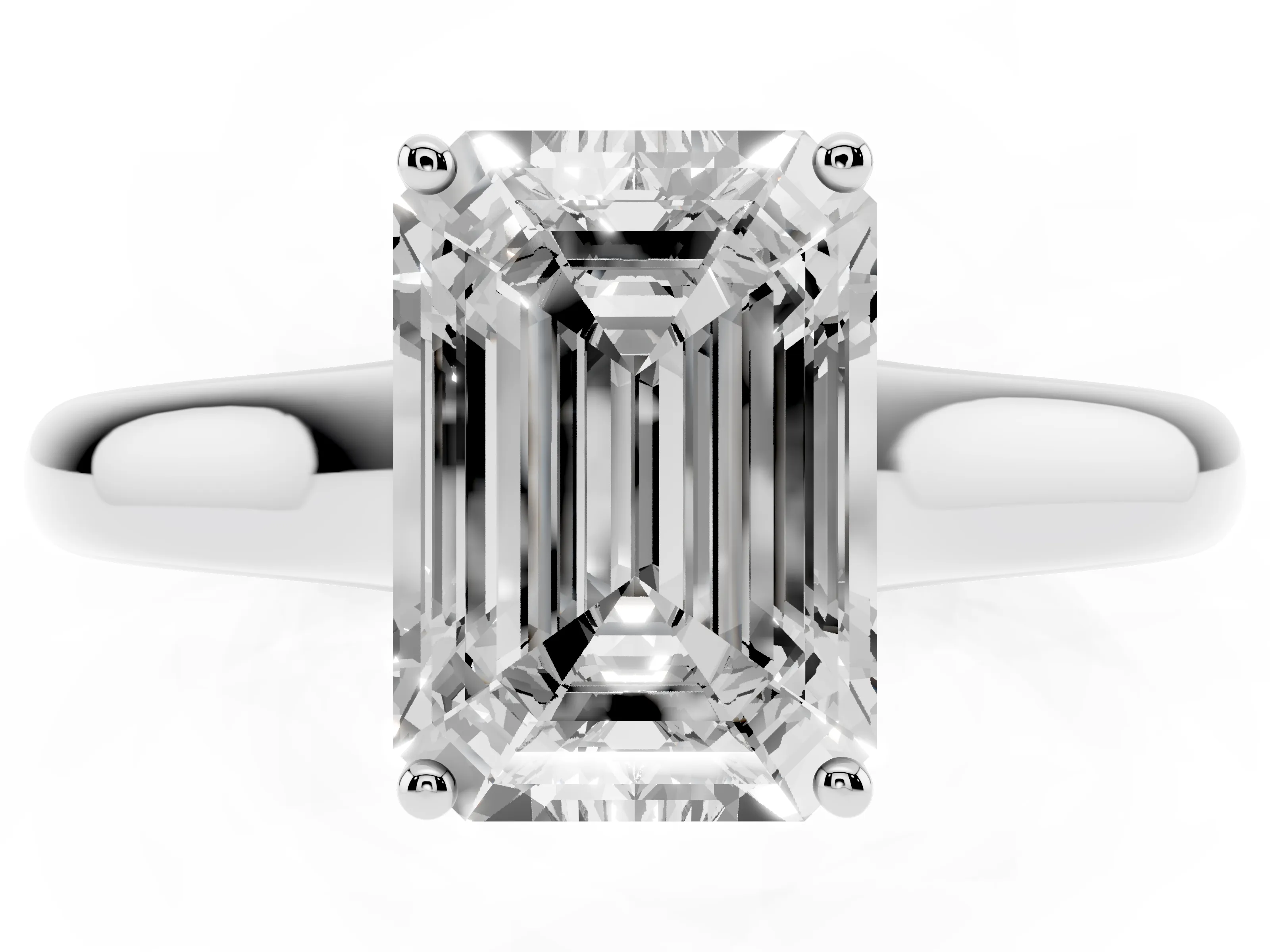 Emerald Cut Diamond Solitaire Engagement Ring Set in White gold with Subtly Tapered Band and Prong Setting