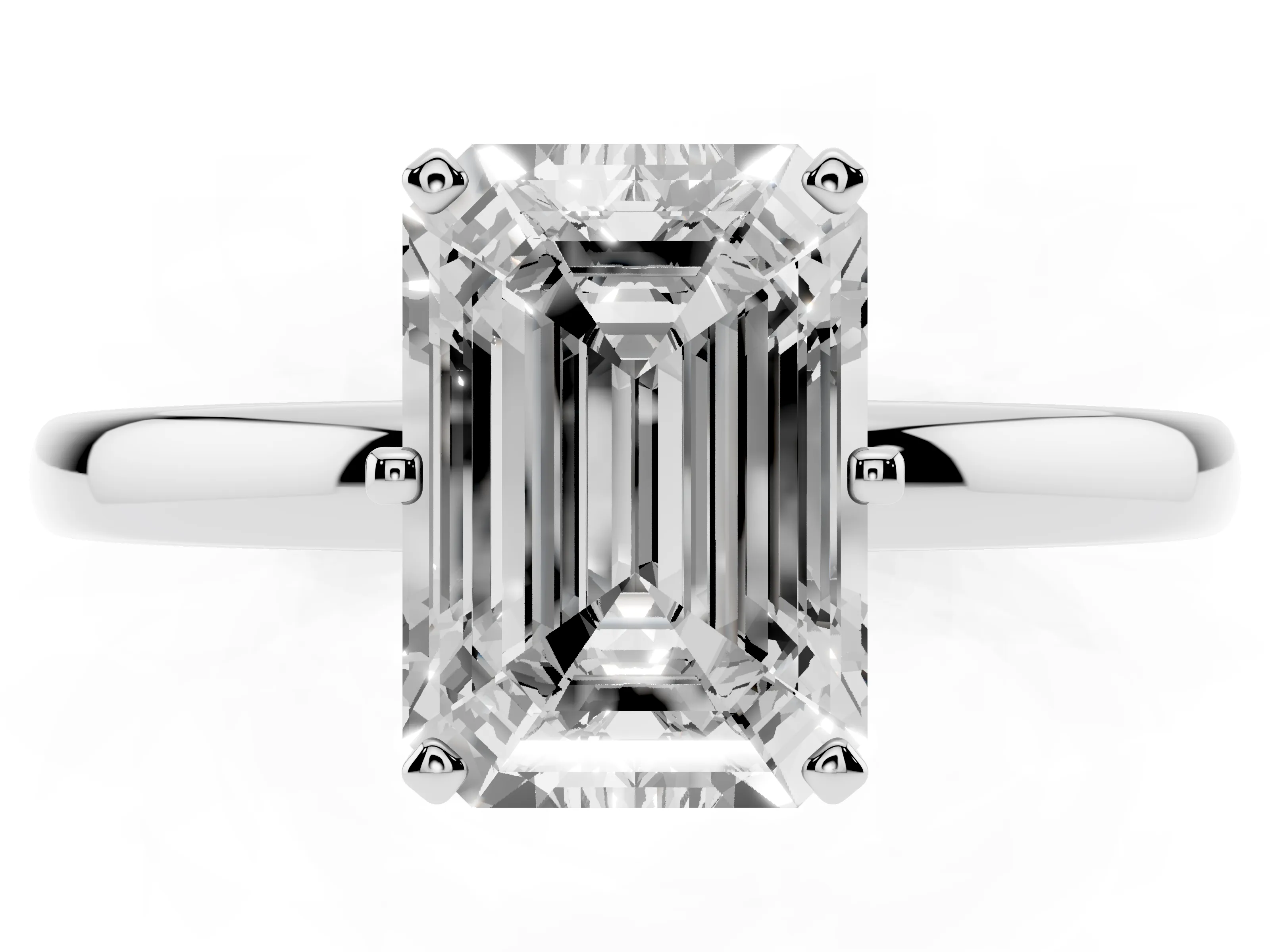 Emerald Cut Diamond Solitaire Ring Set in White gold with Raised Prong Setting on a Classic Band