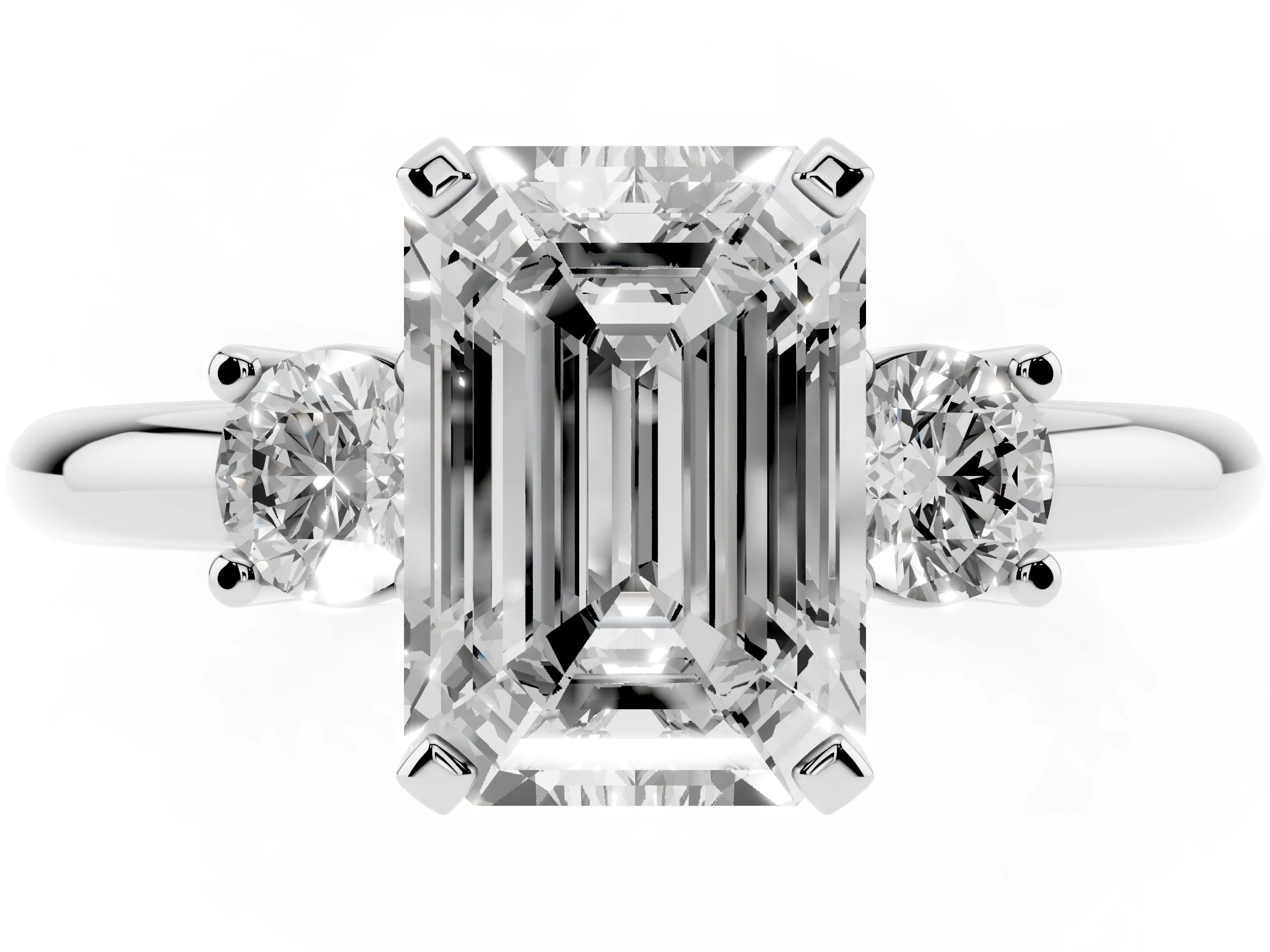 Three-Stone Emerald Cut Diamond Ring Set in Platinum with Prong Setting and Plain Band
