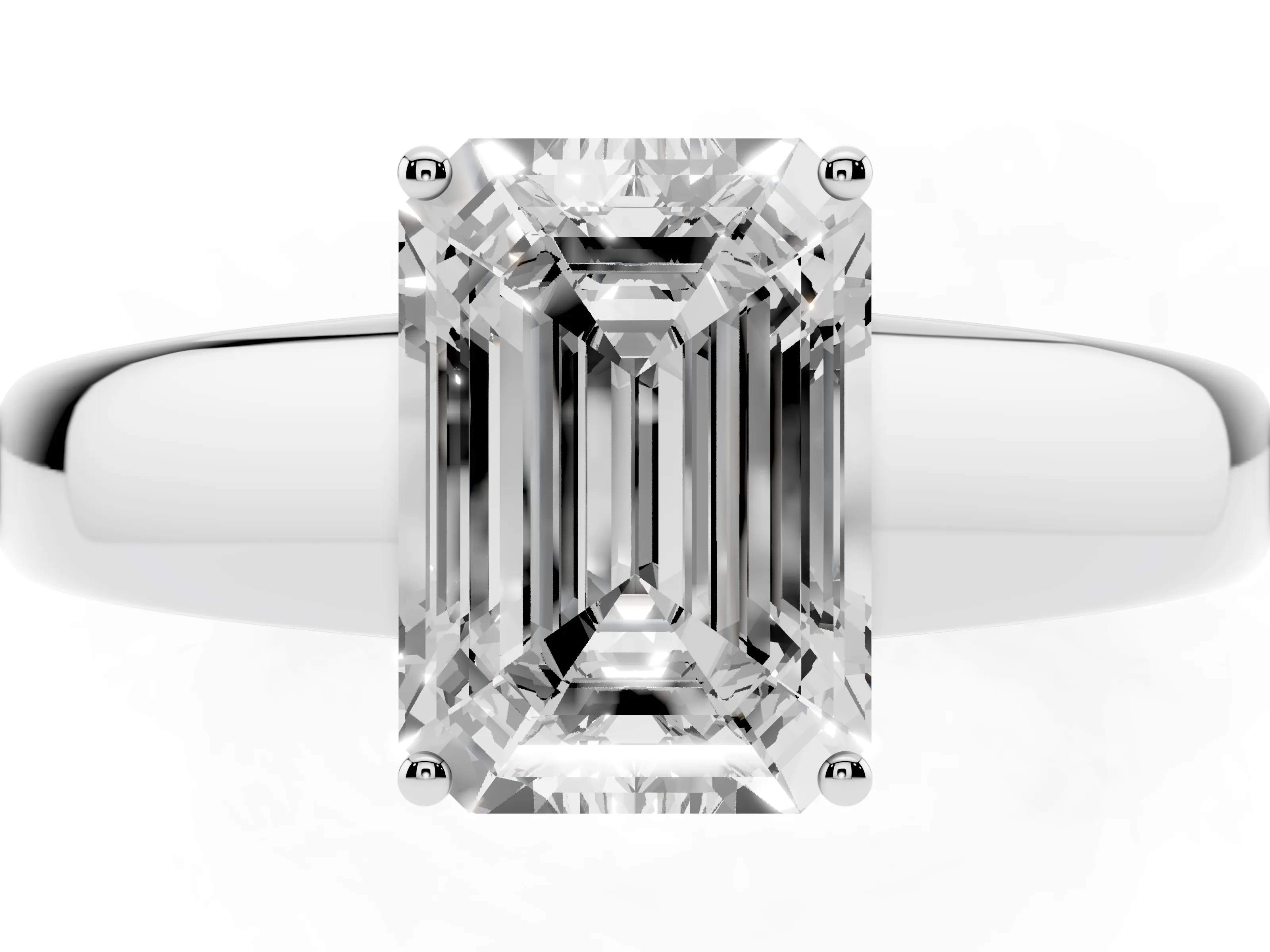 Emerald Cut Diamond Solitaire Ring Set in White gold with Tapered Band and Prong Setting
