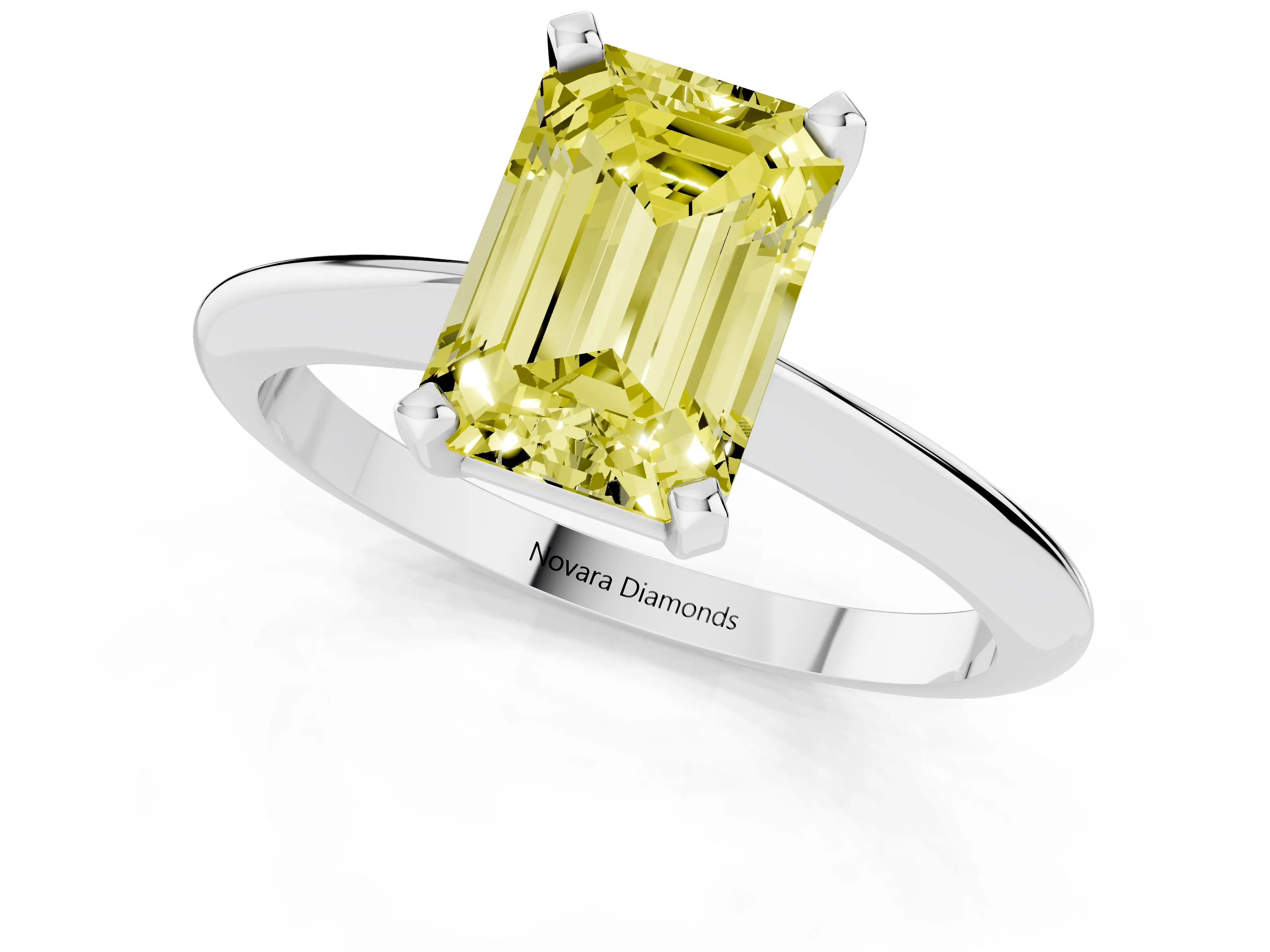 Fancy Yellow Emerald Cut Diamond Solitaire Ring Set in Silver with Prong Setting on a Plain Round Band