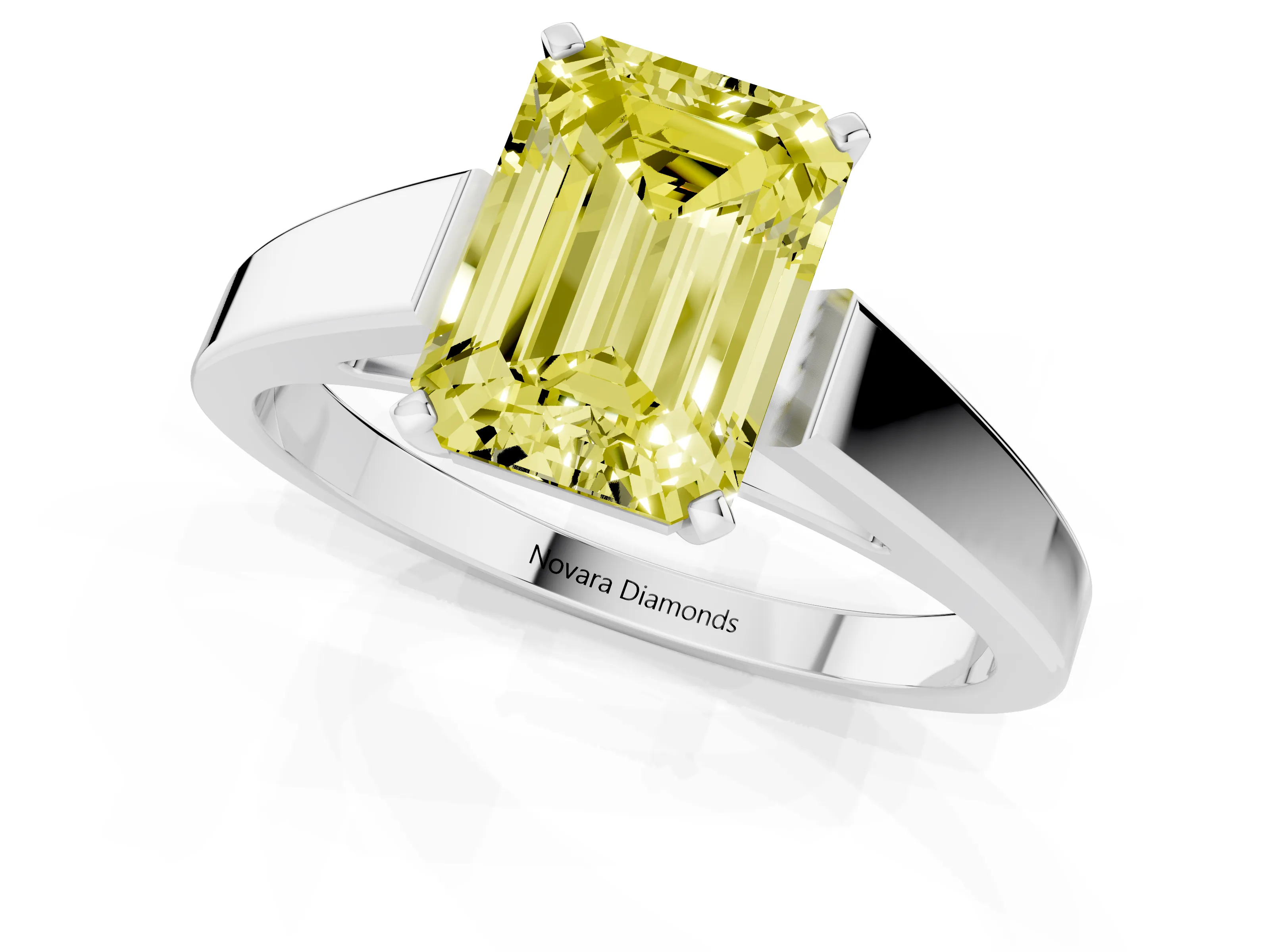 Fancy Yellow Emerald Cut Diamond Solitaire Engagement Ring Set in White gold with Prong Setting and Tapered Band