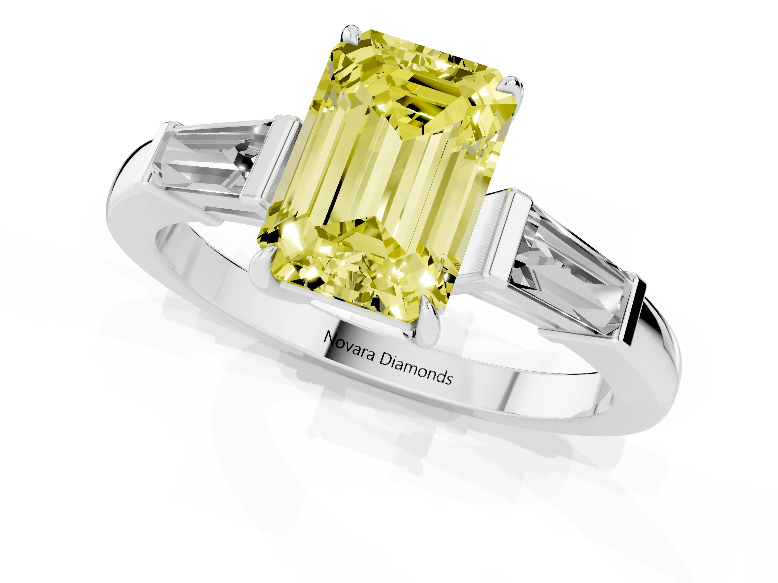 Fancy Yellow Emerald Cut Diamond Three-Stone Ring Set in Platinum with Tapered Baguette Side Stones and Prong Setting