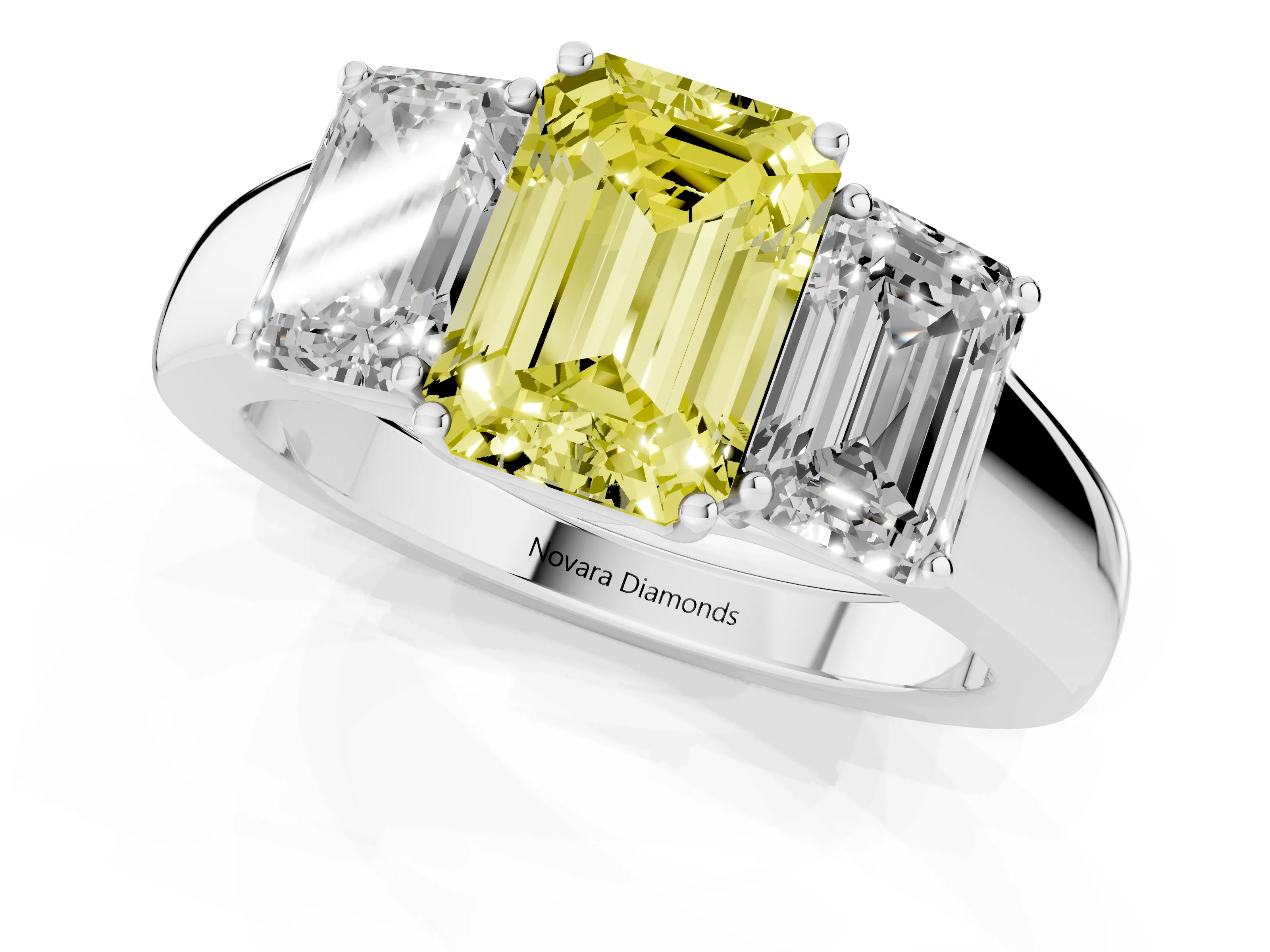 Fancy Yellow Three-Stone Emerald Cut Diamond Ring Set in White gold with Matching Prong Settings and Plain Band
