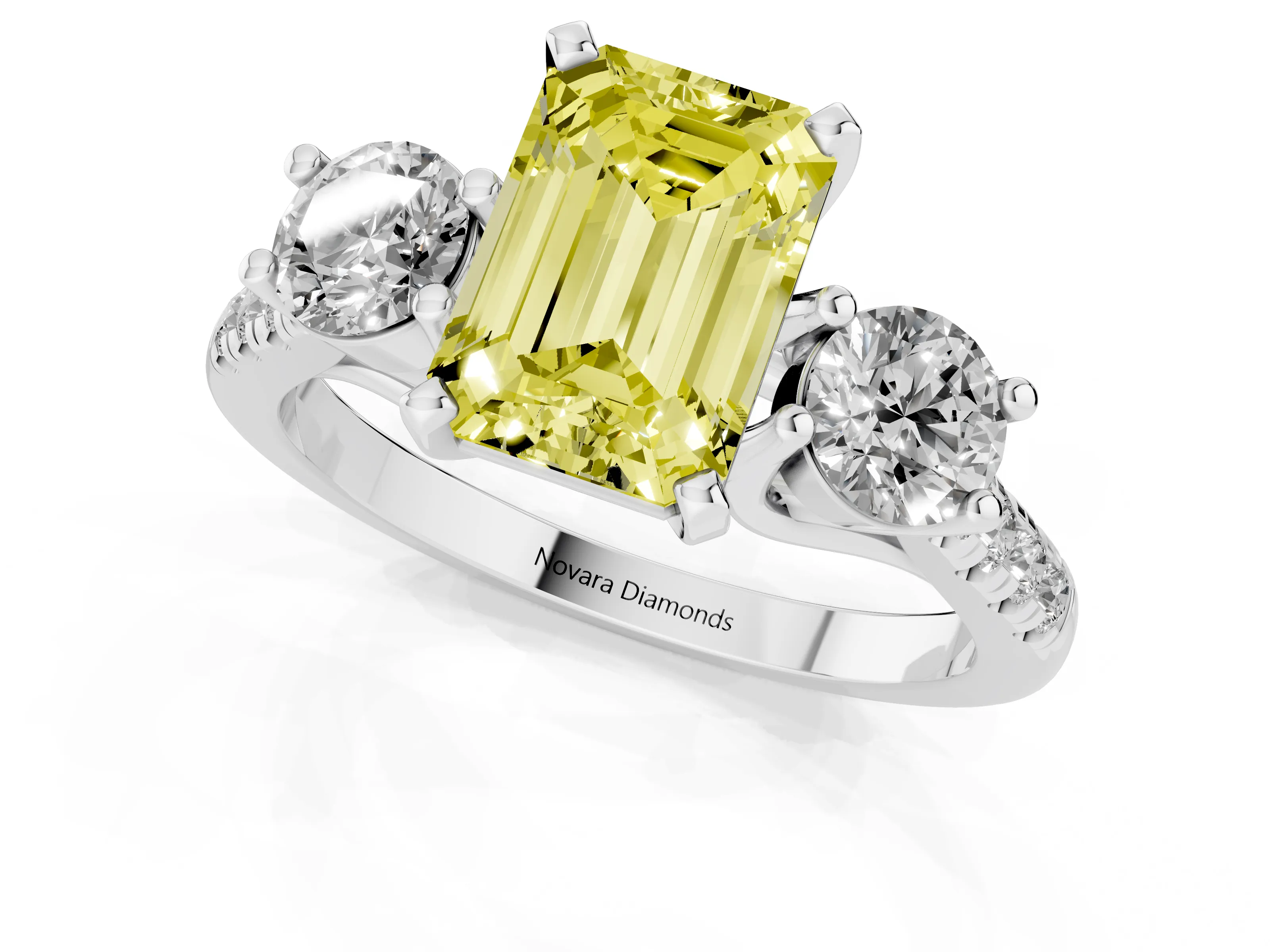 Fancy Yellow Three-Stone Emerald Cut Diamond Pavé Band Ring Set in White gold with Prong-Set Trio