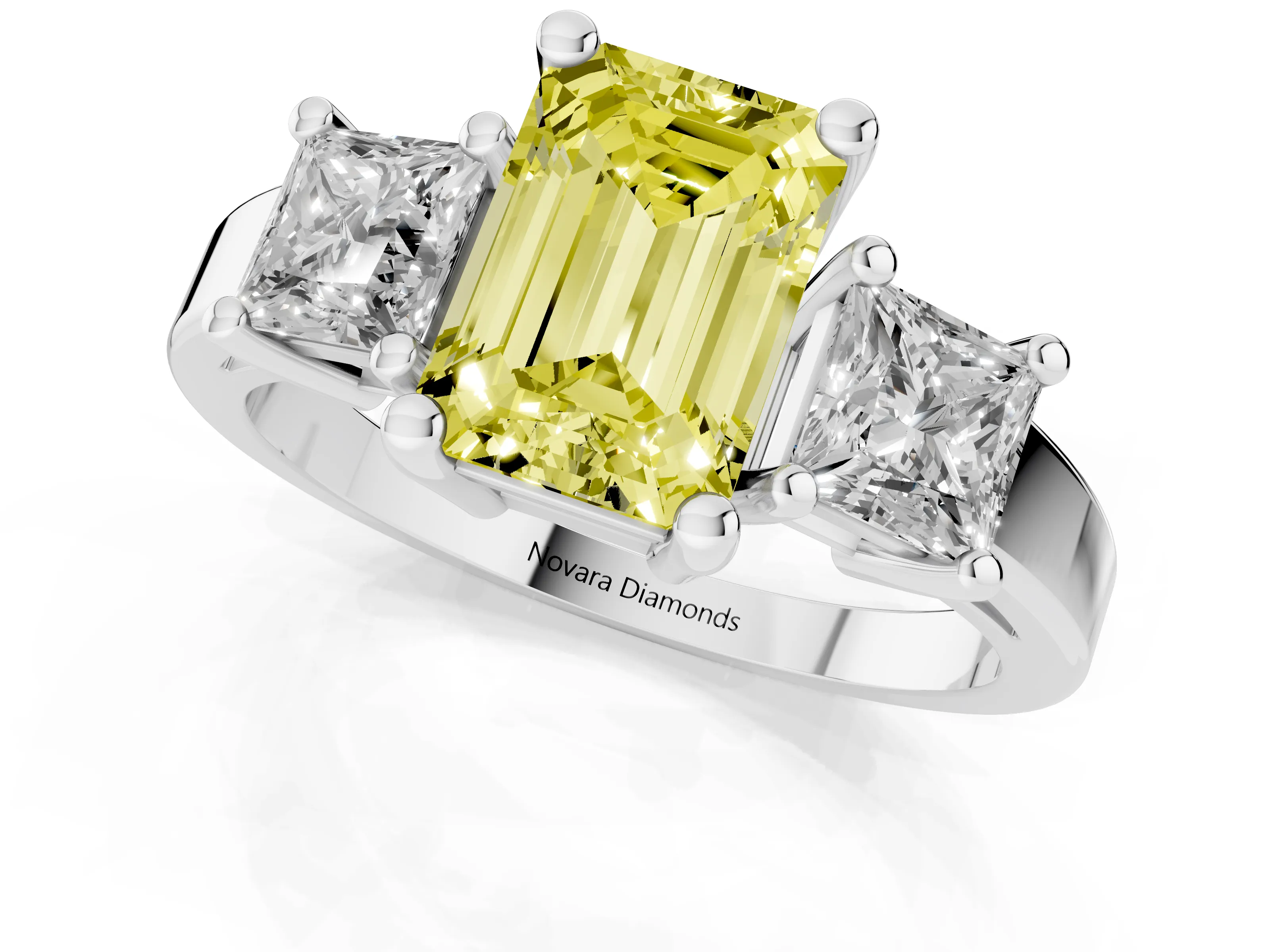 Fancy Yellow Three-Stone Emerald Cut Diamond Solitaire Ring Set in Platinum with Prong Setting